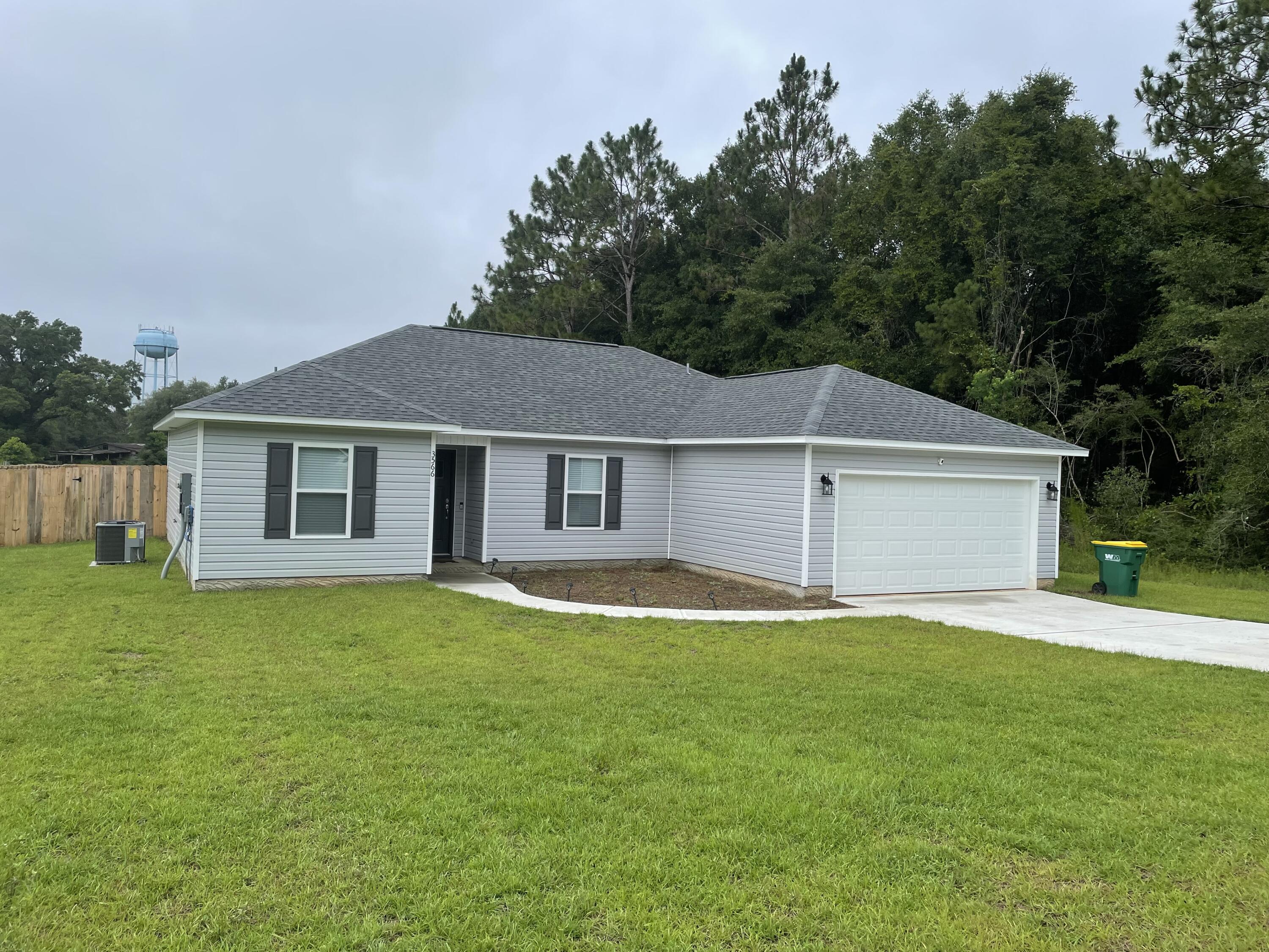 Available for move in August 1st! Practically brand new 4 bedroom/2bath home with large privacy fenced back yard. Well appointed kitchen with stainless steel appliances, granite counter tops, & solid wood cabinetry. LVP throughout, no carpet! Great floor plan with split bedroom layout, spacious guest bath, master bath with dual sink vanity, soaker tub as well as separate shower, & walk-in closet.