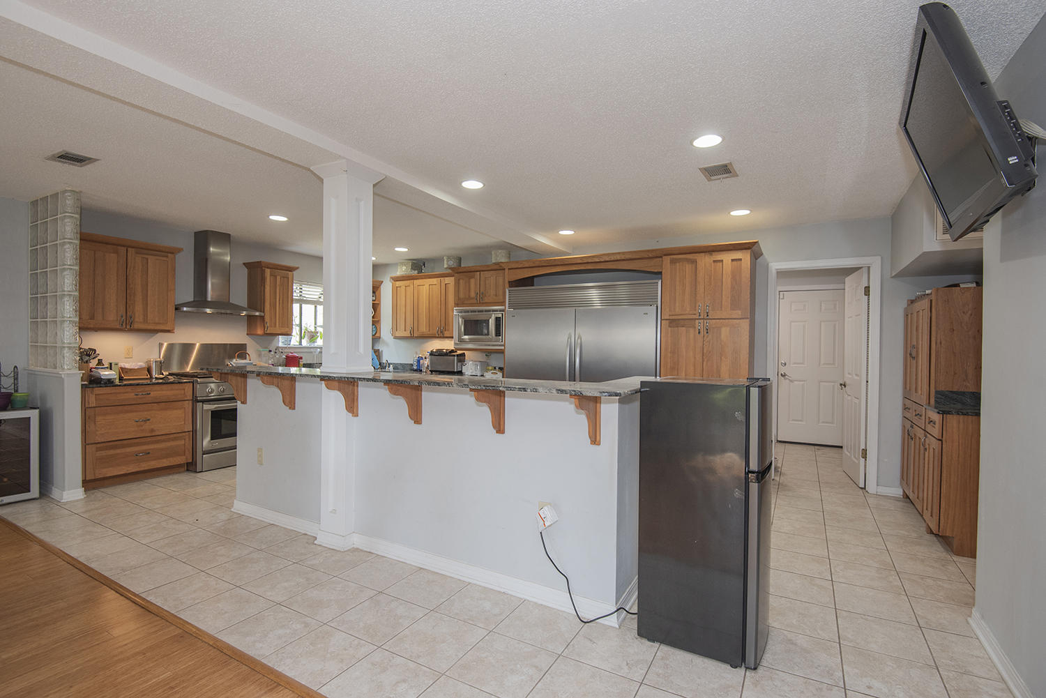 This home is a MUST SEE! Large and roomy, both inside and out, your human family and any furry family members can relax and enjoy plenty of space in the .39 acre yard! Cook your favorite meal in the beautiful gourmet kitchen and enjoy it on the patio beneath the ancient spreading oak. The gourmet professional kitchen features a built in 72'' wide stainless steel refrigerator, a six burner gas stove, dishwasher, microwave  and extensive cupboards and counter space for all your prep tools and gadgets. Beautiful granite and a long island makes it an inviting area to entertain. Extra storage for pantry or cooking items or those holiday accessories is easily accessed on the way through the laundry room toward to garage. The floor plan is well designed with large living room areas and roomy dining open to the kitchen and patio. The first floor master will hold all of your furniture and the beautiful tile in the updated master bath will have you swooning. Upstairs, there is an open loft area currently used as a yoga/exercise space. The two huge guest bedrooms share the full bath between them and have double closets for even more storage space.
Just 8 minutes to Hurlburt and less than 25 to Eglin, the location can't be beat!
The beach is less than 1/4 mile away, Hurlburt barely 3 miles to the east and stores, restaurants, shopping and many attractions just a couple miles further. The neighborhood is quiet and the home is situated on a large corner lot. The pictures dont do it justice. Please call to see it today!