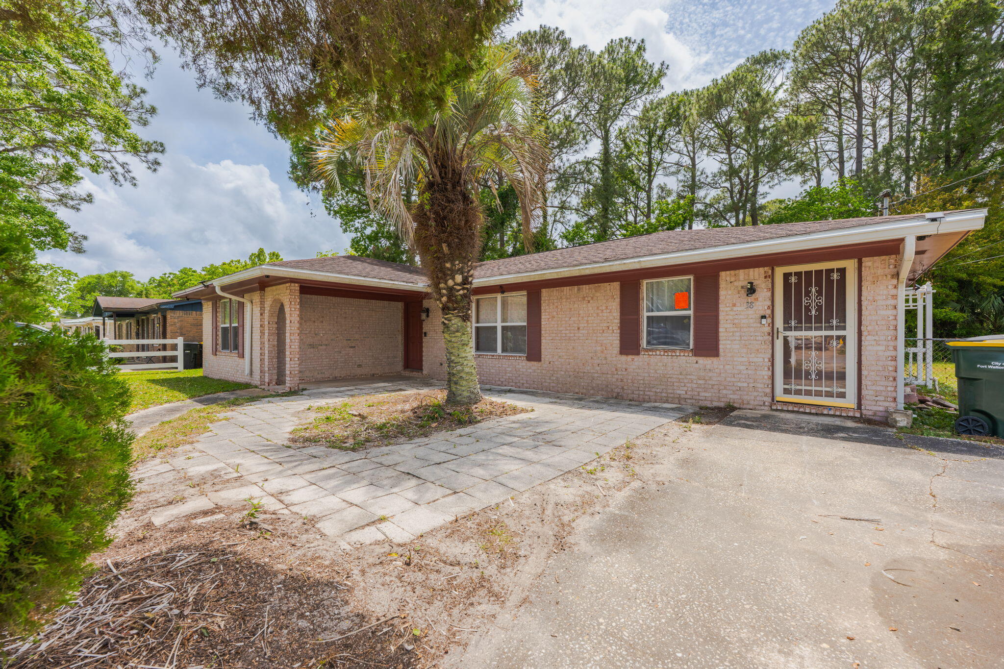 Check out this amazing deal on Deal Avenue! This 3 bedroom/2bath brick home sits on a corner lot in the heart of Fort Walton Beach. Offering two separate living rooms, each with front doors, great for multigenerational living, or a home office. The eat-in kitchen/dining room has a slider to the fenced backyard. The laundry room also has access to the backyard where you'll find a nice shed on a concrete foundation.  The windows have been replaced with double pane vinyl windows, but much of the home does need refreshing/some repairs & updates. The corner lot is fenced in back with chain link, and vinyl fencing in the front. Located close to schools & shopping; about 4 miles to Hurlburt Field, about 7 mi. to Eglin Air Force Base, and 4 mi. to the sugar white sandy beaches of Okaloosa Island!
