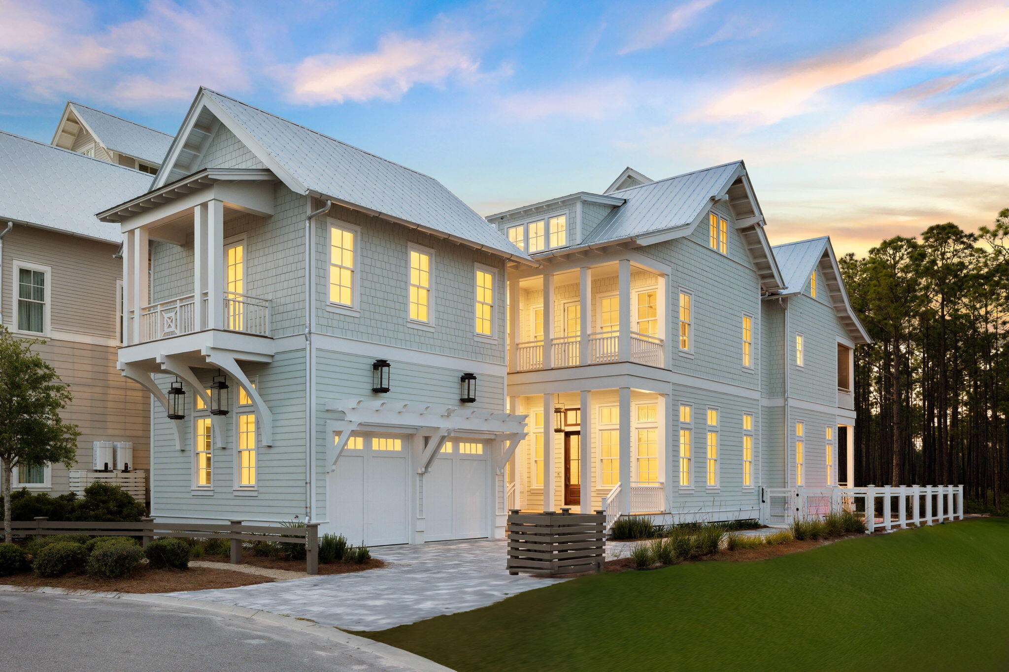 Perfectly positioned at the end of a quiet cul-de-sac in Phase Five of WaterColor, this newly built luxury retreat pairs elevated design with laid-back coastal living—offering a peaceful setting with no short-term rentals allowed. Ideal for families or full-time residents seeking tranquility, the home spans over 5,000 square feet across three levels and features 5 bedrooms, 5 full bathrooms, and 2 half baths, including a private guest suite over the garage with its own full bath, bedroom, closet, and kitchenette. Inside, white oak floors, vaulted ceilings with pecky cypress accents, and carefully curated finishes create a sense of refined comfort. The main living space centers around a marble fireplace, while the adjacent kitchen features Wolf and Sub-Zero appliances, a waterfall island, custom cabinetry, and a walk-in scullery with wine display.

Bathrooms throughout showcase rich tilework, gold fixtures, and designer lighting, each with its own spa-like feel. The primary suite is a private sanctuary with vaulted ceilings, a custom walk-in closet, and a luxurious en suite featuring double vanities and a spacious glass-enclosed shower.

A second-floor family room with a wet bar offers additional living space, while guest suites with en suite baths and walk-in closets provide comfort and privacy. The third-floor bonus room with a full bath delivers flexible space perfect for a home theater, bunk room, or game area.

Step outside to a heated cocktail pool and spa, multiple covered porches, a screened balcony, and a fully fenced yard bordered by preserved greeneryblending indoor comfort with outdoor serenity.

While privately tucked away, the home remains just a short stroll from the WaterColor Beach Club, the Boathouse, and charming local shops and restaurants. With access to resort-style pools, tennis courts, parks, and trails that lead directly to Seaside, this home captures the best of 30Awhere every detail invites you to slow down, settle in, and enjoy the lifestyle.