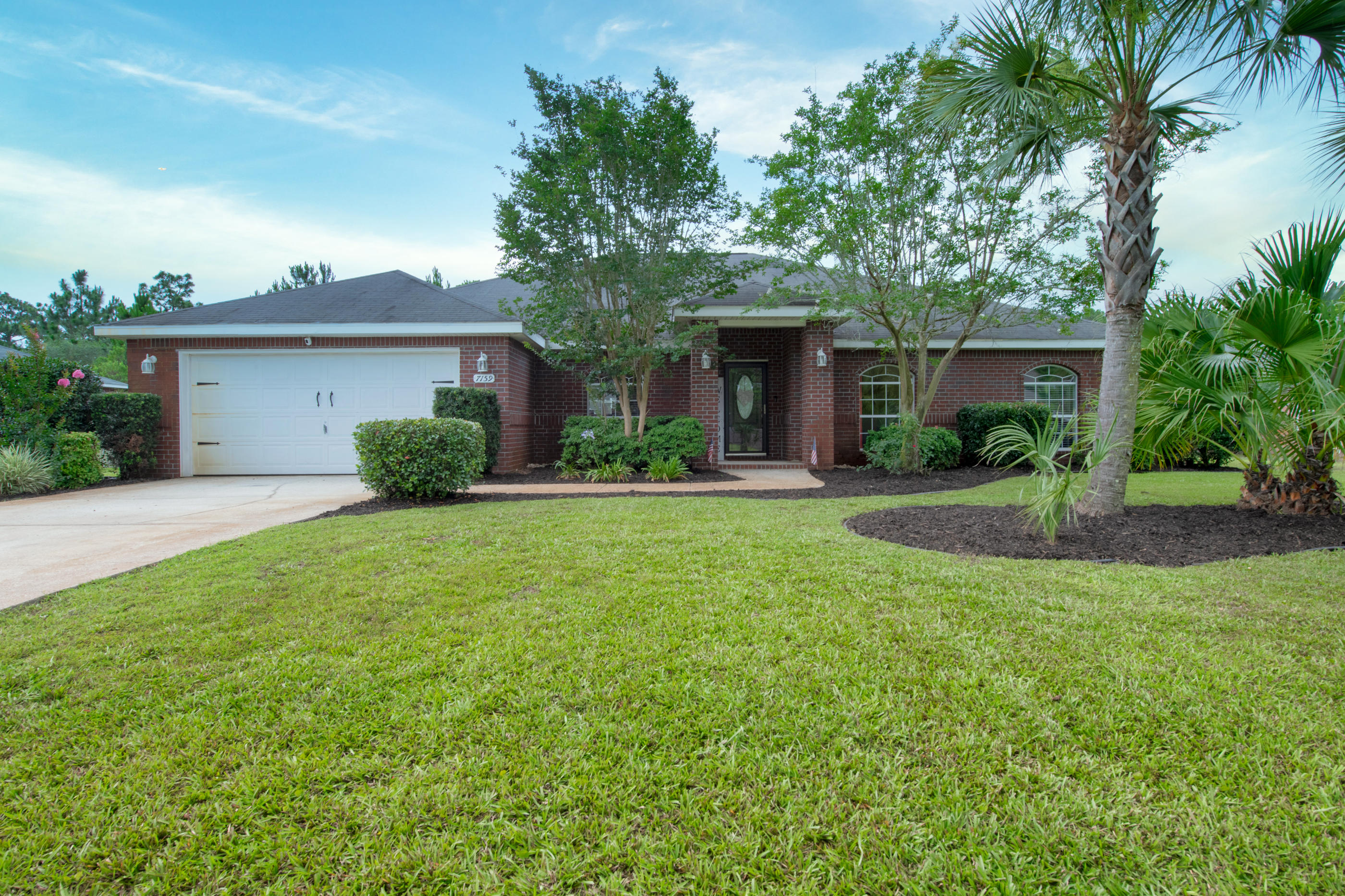 Welcome Home! This gorgeous pool home with 4 bedrooms, 3 bathrooms + an office sits in the Hidden Creek Subdivision tucked in close to the Hidden Creek Golf Course! The foyer unfolds to the office and formal dining area. The open concept living room and kitchen provide beautiful views of the pool through the triple sliding glass doors. The custom built in cabinets w/backlighting surround the wood burning fireplace accentuating the quartz stone & wood mantle! The home features wood-look tile throughout the main living areas. The formal dining room features great natural light, wainscoting, & a chair rail. The office area is bright, cheery, and ready to be used as a work space, a den, or a playroom. The large open living room is welcoming and functional for gatherings flowing into the eat-in kitchen with a breakfast bar & nook. The kitchen is a chef's dream with a large granite island, tons of cabinet space, walk-in pantry, and stainless steel appliances. The large master bedroom has plenty of room for a sitting area in addition to a king size bed. The master bath includes two large walk-in closets, separate shower and jetted tub, and a double vanity with newly painted cabinets! Bedrooms 2 and 3 share a bath with a double vanity and full-size bathtub/shower combo. The 4th bedroom would make a wonderful second master, in-law suite, or guest quarters as it has its own bathroom and private door to the enclosed pool lanai. The backyard is well landscaped, including full irrigation lawn pump, a screened in pool lanai and fully fenced in lot. The beautiful gunite pool and patio area are what Florida living is all about! This house is ready for new homeowners to enjoy!