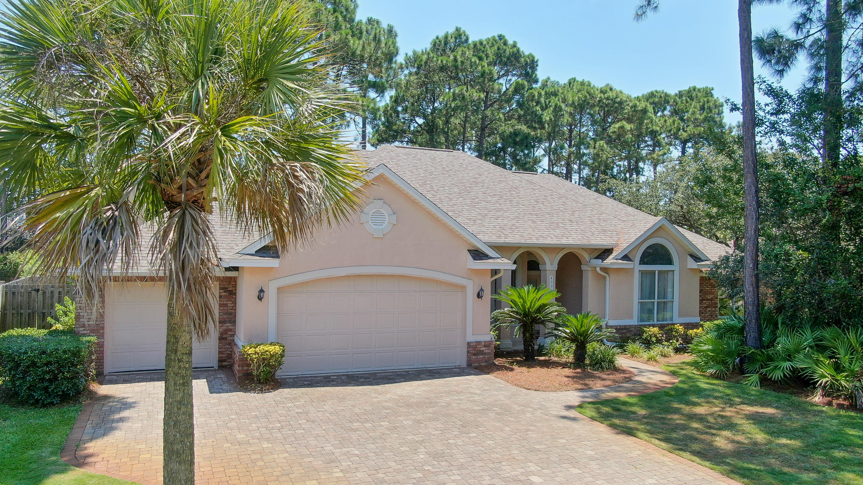 Location is everything with this perfectly kept home right in the heart of Destin with 4 bedrooms and 2.5 baths with a 3 car garage. It also features a huge enclosed patio area perfect for entertaining that is overlooking a large backyard. It's one you can relax in and enjoy a peaceful evening at. This home also features a family room and a living room for lots of room to create the perfect family home to build memories in. This home has it all! Enjoy the ever-popular and family-friendly neighborhood of Indian Trail that is close proximity to the Destin Harbor District and Destin Elementary among many other conveniences. This is a great opportunity to own in Destin! This home has been very well cared for and is ready to welcome new owners. Come by and take a look before it's gone!