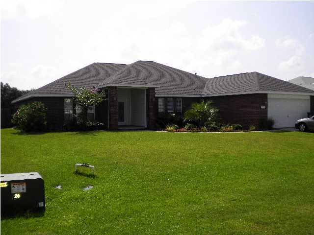 Lawn Service Provided, Community pool and tennis!! Call today to see this spacious 4BR/2.5BA brick home! You'll enjoy the open floor plan with a large family room w/ firplace, dining room or office, gorgeous kitchen with granite countertops, tiled backsplash, breakfast nook and breakfast bar, split bedroom plan with large master bedroom, two walk in closets, large master bath with garden tub, separate shower, two vanities and more. Lots of room to grill or play in the privacy fenced back yard with open patio. And you have access to the community pool and tennis courts just down the street!