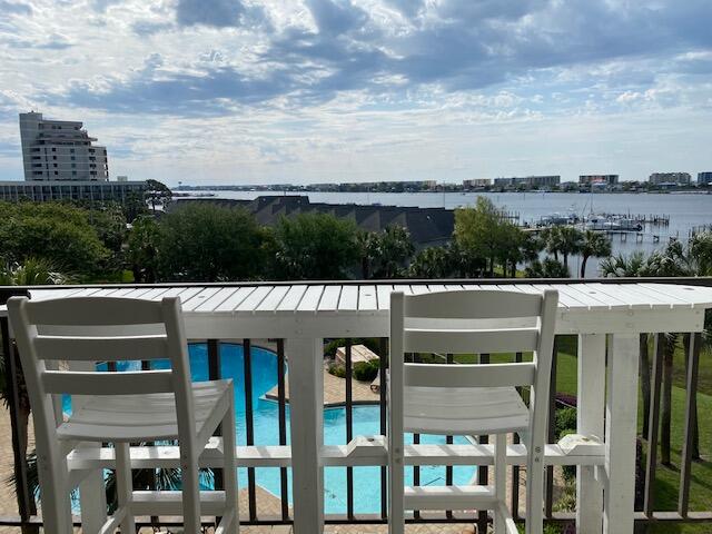 AN EXCELLENT ''DIRECT WATERFRONT'' STUDIO JUST CAME ON THE MARKET..   TOP (4TH) FLOOR WITH BEAUTIFUL SUNRISE VIEWS ON THE WATERWAY, FOR YOUR ENJOYMENT.  ALSO COMES WITH A LARGE 44FT BOAT SLIP #B05.

A VERY NICELY UPDATED INTERIOR THROUGHOUT, TRULY MOVE-IN READY FOR YOUR PERSONAL USE..,, (OR)  RENT IT OUT SHORT OR LONG TERM FOR ADDITIONAL REVENUE.  YOU CAN ALSO USE THE BOAT SLIP PERSONALLY, OR RENT IT OUT AS WELL

COMPLEX HAS TWO SUPER SIZED POOLS, BBQ GRILLS, PICNIC AREAS, AND YOU ARE ONLY STEPS AWAY FROM A SMALL PRIVATE BEACH  AREA, FOR ONLY THE OWNERS AND GUESTS OF PIRATES BAY.  ALSO HAS ELEVATOR AND/OR STAIRS FOR YOUR CONVENIENCE.   VIEW THE MANY PHOTOS ON THE MLS, AS WELL AS DOCUMENTS FOR INFORMATION.. 

PIRATES BAY IS ONLY A SHORT DISTANCE TO MANY RESTAURANTS, THE MALL,  ''CLICK MORE' THE MILITARY BASES... ALSO JUST A QUICK DRIVE TO OUR OKALOOSA ISLAND WHITE SANDY BEACHES, THE FISHING PIER, AND LARGE CITY PARK FOR YOUR ENJOYMENT.  ONLY A SHORT JAUNT TO DESTIN, NICEVILLE, CRESTVIEW AND NAVARRE.. AND EVEN PENSACOLA IS NOT BUT ABOUT 45 MINUTES..

COIN AND CERDIT CARD OPERATED WASHERS AND DRYERS ARE LOCATED ON THE 2ND AND 3RD FLOORS OF EACH BUILDING.

ASSOCIATION DUES COVERS A GREAT DEAL OF ITEMS:  WATER; SEWAGE; TRASH DUMPSTER; QUARTERLY PEST SERVICE; CABLE TV W/TWO HBO'S; AS WELL AS HI-SPEED WIRELESS INTERNET WIFI

DUES ARE $1,858 PER QUARTER... THEY'VE CURRENTLY BEEN INCREASED FOR A SHORT PERIOD, (THE REMAINING OF THE 2021 CALENDAR YEAR), AND THEN ARE TO REVERT BACK TO APPROXIMATELY THE PRIOR $1,377 LEVEL ON 1/1/22.  THE SHORT TERM INCREASE AMOUNT QUARTERLY, IS GOING STRAIGHT INTO THE RESERVE FUNDS FOR MAJOR COMPONENTS.

ALL SPECIAL ASSESSMENTS HAVE BEEN PAID BY THE SELLER. AS YOU WILL NOTE THE MARINA IS BEING REPAIRED AND REPLACED FROM THE DAMAGES STEMMING FROM HURRICANE SALLY.  HOPE TO HAVE IT FULLY OPERATIVE VERY SOON.

THE ROOF ON "A" BUILDING IS IN THE PROCESS OF BEING REPLACED AS WELL, DUE TO THE SAME STORM.  THERE IS NO SPECIAL ASSESSMENT BEING NEEDED FOR THIS, THANKS TO INSURANCE, ETC.