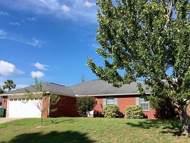 Welcome home to this charming 4 bedroom, 2 bath home. Located in South Crestview, which gives you easy access to Duke Field and Eglin. This home features a large family room with access through the French door to the fenced back yard. Kitchen comes fully equipped with stainless steel appliances and pantry. Split bedroom design. Large master bedroom. Master bath has walk in closet, garden tub, double vanity, and separate shower. Three additional bedrooms, a 2nd bath, alarm system, and laundry room off of kitchen makes this home complete. Sprinkler system and yard building for storing all of your tools and garden equipment adds the finishing touch. Don't let this one pass you by, call for an appointment today! All buyers to verify any and all information they deem important.