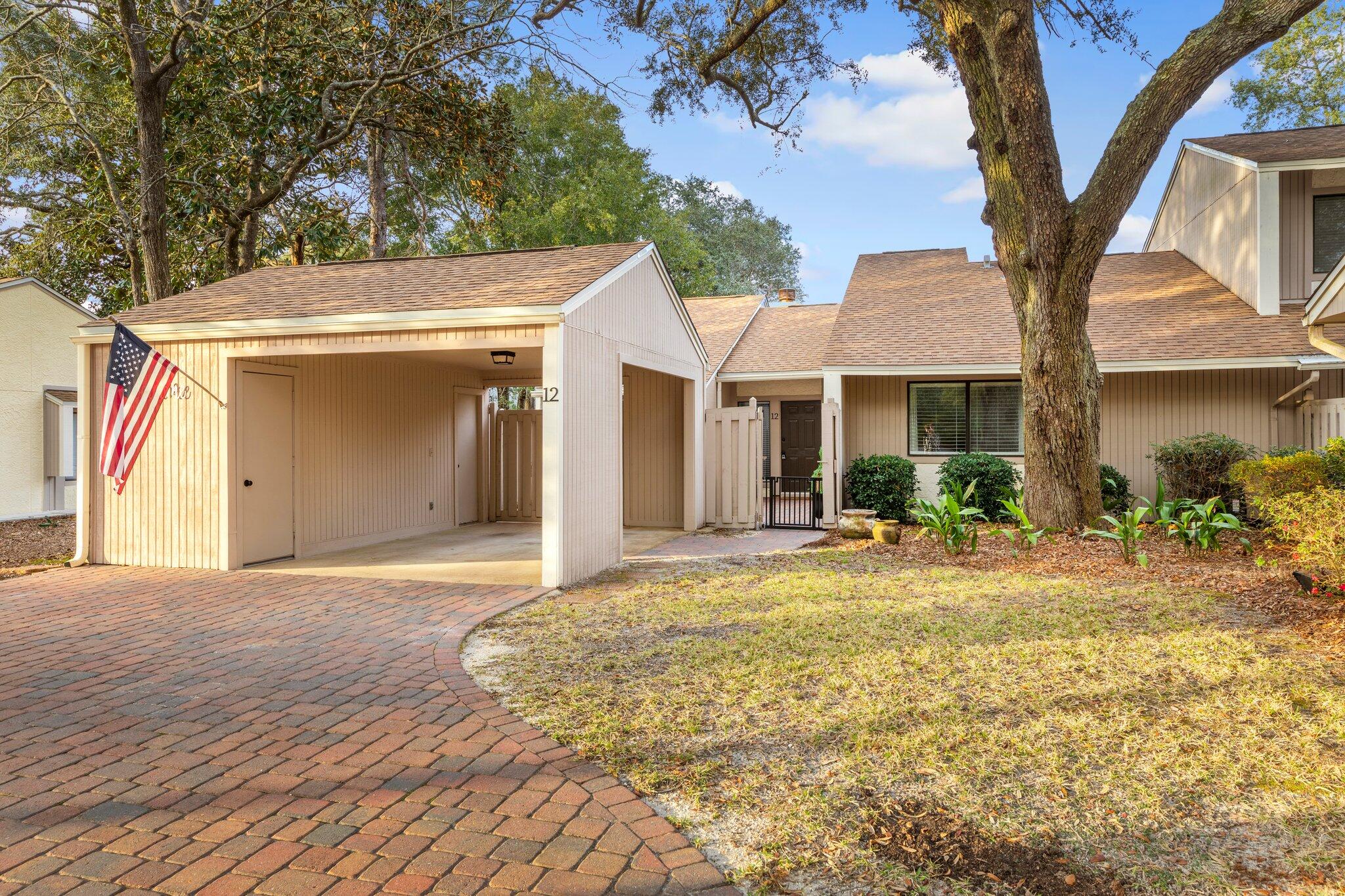 Don't miss seeing this beautifully renovated Bluewater Bay townhome! From the moment you enter through your private courtyard you'll be impressed by the LVT flooring throughout, all new kitchen with white cabinets plus accent open shelving, quartz countertops, stainless appliances and subway tile backsplash, new bathroom cabinetry, sinks/countertops, faucets, light fixtures, etc. The fireplace with new mantle and tile surround is the focal point of the great room which opens to the dining area. The master bedroom has an ensuite bath, walk-in closet and sliding doors opening to the rear patio.

Come take a look at it today!