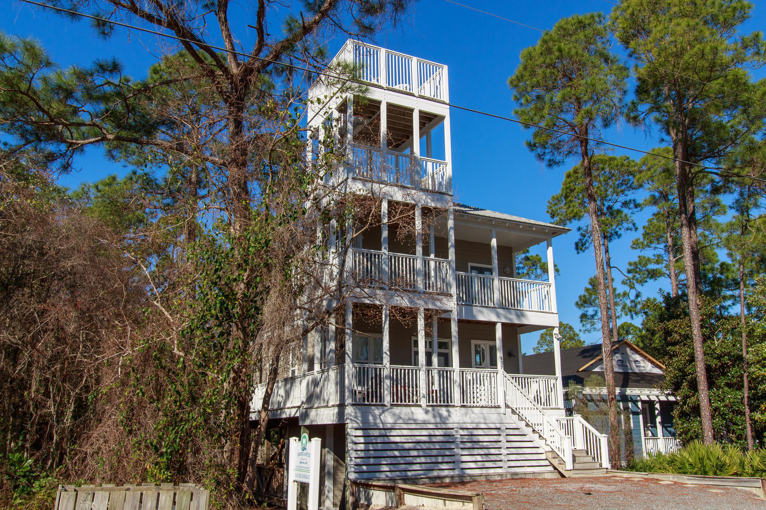 Sitting on a double-lot at .31 acres and at 2,138 Sq Ft this 4 bedroom 3 bath home is a gem in the heart of Seagrove Beach. Offering a large living area (with all furnishings that can be negotiated for $200 more a month or can be removed if renter has own furnishings), large kitchen plus 4 spacious bedrooms, one master suite with private large bathroom with separate walk-in shower and tub as well as double sinks, and three additional bedrooms with two other full bathrooms make this a very comfortable home. An outdoor entertainment area is located at the ground level which has a pool table and its a great place to gather with friends.
Barely over just a mile away from the famous town of Seaside, this home allows you to enjoy all of the perks 30A has to offer while being able to retrieve to your own private oasis. A viewing platform at the very top of the home offers majestic views of the gulf's emerald green waters and sunsets over the horizon.