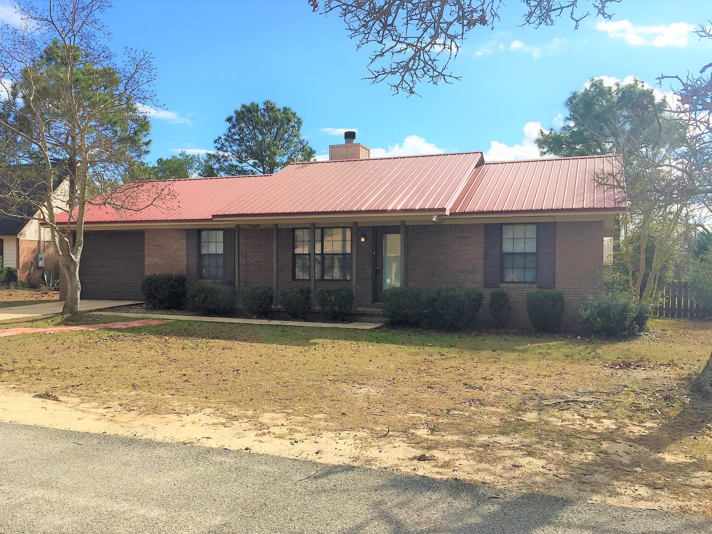 South of I-10 and just a few miles North of Duke Field and Eglin AFB. This 4-bedroom 2-bathroom home features a nice sized living room w/ vaulted ceiling and a wood burning corner stone fireplace. The kitchen is equipped with stove, fridge, dishwasher, and washer/dryer hook-ups. The master suite has tray ceilings, carpeted with a master bath and walk-in closet. The 4th bedroom could be used for a Man Cave, She Shed, Playroom, Office, or Gym. The LARGE fenced backyard has a covered open patio. Great for cookouts, birthdays, or entertaining family and friends!! PETS ALLOWED upon owner's approval and with a non-refundable pet fee! CALL TODAY!!