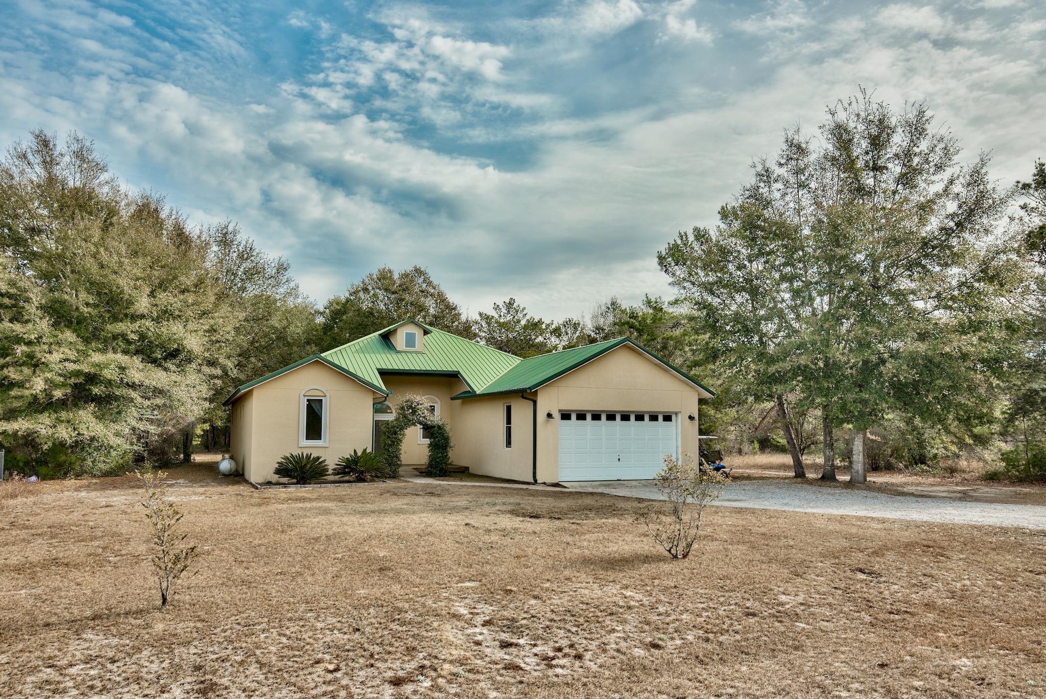 BACK ON THE MARKET! Live the a more natural life! This home is ideal for people wanting a return to a more simple way of living with out all the hustle-n-bustle of urban areas. The home is surrounded by NW Florida's most beautiful natural settings --wooded lots and deep waters of Black Creek. The neighborhood has a deeded access point with boat launch and a community dock. Black Creek feeds into the Choctawhatchee and Jolly Bays, home of some of the most amazing fishing spots in the area! Own your piece of paradise, less than 15 miles away from Santa Rosa Beach, the 30A sugar-white beaches and the emerald green waters of the Gulf of Mexico. Too many unique features to list, schedule your private appointment today!