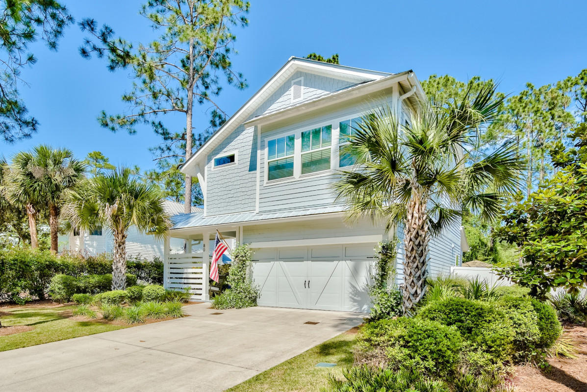 ACCEPTING BACK UP OFFERS This is a quality 2017 built home and is in a prime Seagrove location that will suit everyone's needs! The expansive 8050sf LOT is centrally located SOUTH of 30A & across the street from one of the area's largest rare coastal dune lakes where a quiet neighborhood park with boat launch provides easy access to Eastern Lake ( kayaks OR motorized boats ) and leads straight to the gulf!  Or, you can take the 3 minute bike or golf cart, included, to connect you to two flat beach access points.

As you enter this 4 Bed / 3.5 Bath home you'll be impressed with its abundance of natural light allowed by the entire back wall of high impact rated casement windows. An open concept design and custom upgrades gives it a Modern Coastal feel. The chef's kitchen is adorned with quar 9 ft island/breakfast bar, walk-in lockout pantry, loads of shaker soft close cabinets for storage and stainless steel appliances.  Unload your groceries straight from a 2 car garage. The spacious living/dining/kitchen area boasts 12 ft ceilings and is covered with beautiful wide plank hardwood flooring. The home is wired for an alarm system, surround sound, outdoor speakers and has a flat front and back entry into a HUGE fully fenced backyard making this home a breeze for entertaining. Plenty of room for both a guest house and large pool! 

As you head upstairs, you will find a walk-in laundry room next to the Master Suite which hosts a stunning coffered ceiling, recessed lighting and a shiplap accent wall. You will then enter a large walk-in closet with a lockout option, master bath with dual vanity sinks on quartz countertops, whirlpool soaking tub and a large walk-in glass shower with dual rain shower heads.  The hallway then leads to an additional master en-suite plus 2 other bedrooms with hallway guest bath and linen closet!  
 
Other features include: Low HOA $50/monthly, front and back patios, wireless thermostat, stereo + flat screen TV's throughout, sprinkler system, gutters, tin roof and mature landscaping with your own palm trees!  Enjoy stargazing at night under the recently constructed gazebo that hosts Edison lights and firepit providing tranquility in the middle of where it's all happening.  Situated next to Watersound West/The Hub and 5 minutes from Seaside you have the BEST of 30A without a highly congested neighborhood. Great property for retirees, permanent residents or investors!! Excellent rental history!
 
Home is offered rental ready, partially furnished and 'AS IS'. Buyer to verify all dimensions.