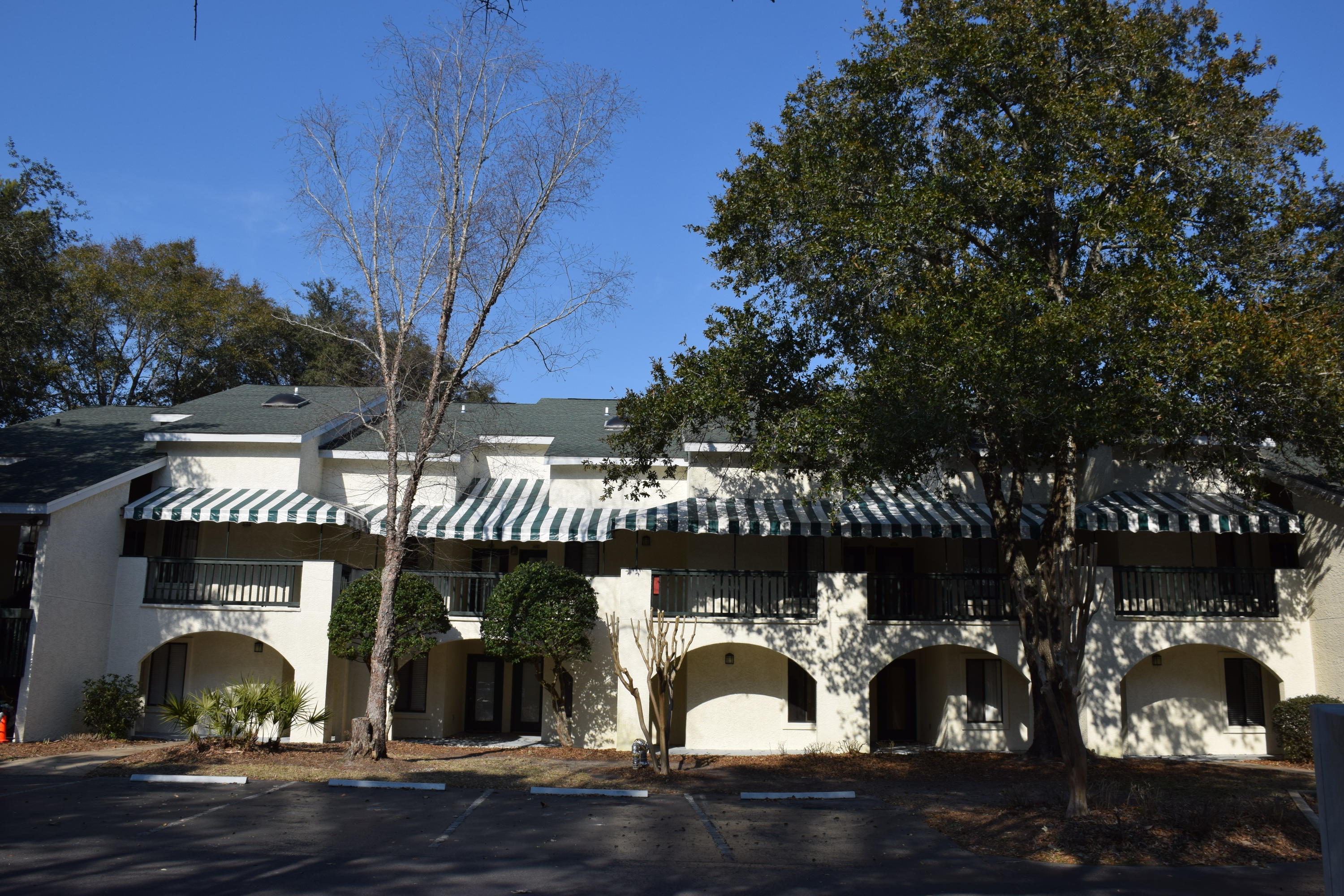 SELLERS WILL ACCEPT A BACKUP OFFER. BUYERS EXTEND CLOSING TO 11/2.
Welcome to one of the brightest & most open Lakeside condos, the Dogwood model. With wrap-around glass doors opening onto the 27'deck, you have a permanent invitation to be outside to relax, entertain, or enjoy quiet meals!
Virtually brand new from floor to ceiling: Armstrong wood laminate in the great room and bedrooms; new tile in the kitchen and baths. Beautiful Kraftmaid cabinetry & granite counters in the kitchen and both baths. New lighting and plumbing fixtures, appliances (ex: the stacked washer and dryer ''as is''). All baseboards have been replaced and crown molding added. Freshly painted and ready for a new owner! Practical facts: HVAC dates from 2005 with a 2014 coil. Owners renovated but NEVER lived