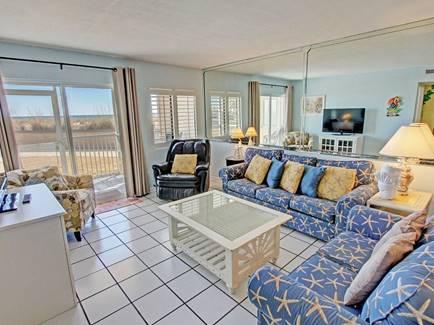 Take advantage of this private, gulf front, ground floor corner 2 bedroom, 2 bath unit located in the gated community of Holiday Surf & Racquet Club. Heated pool, shuffleboard, fitness center, private beach, newly renovated lobby.