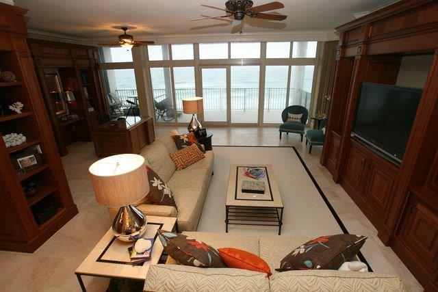 This unit was completely renovated and includes a bunk room. Everything including the metal studs were replaced with the finest materials. The windows are 150mph German impact resistant glass, travertine floors throughout, marble/granite counter tops, extensive custom cherry cabinetry and built-ins, Wolf/Sub-zero appliances, built-in cappuccino maker, Kohler faucets,