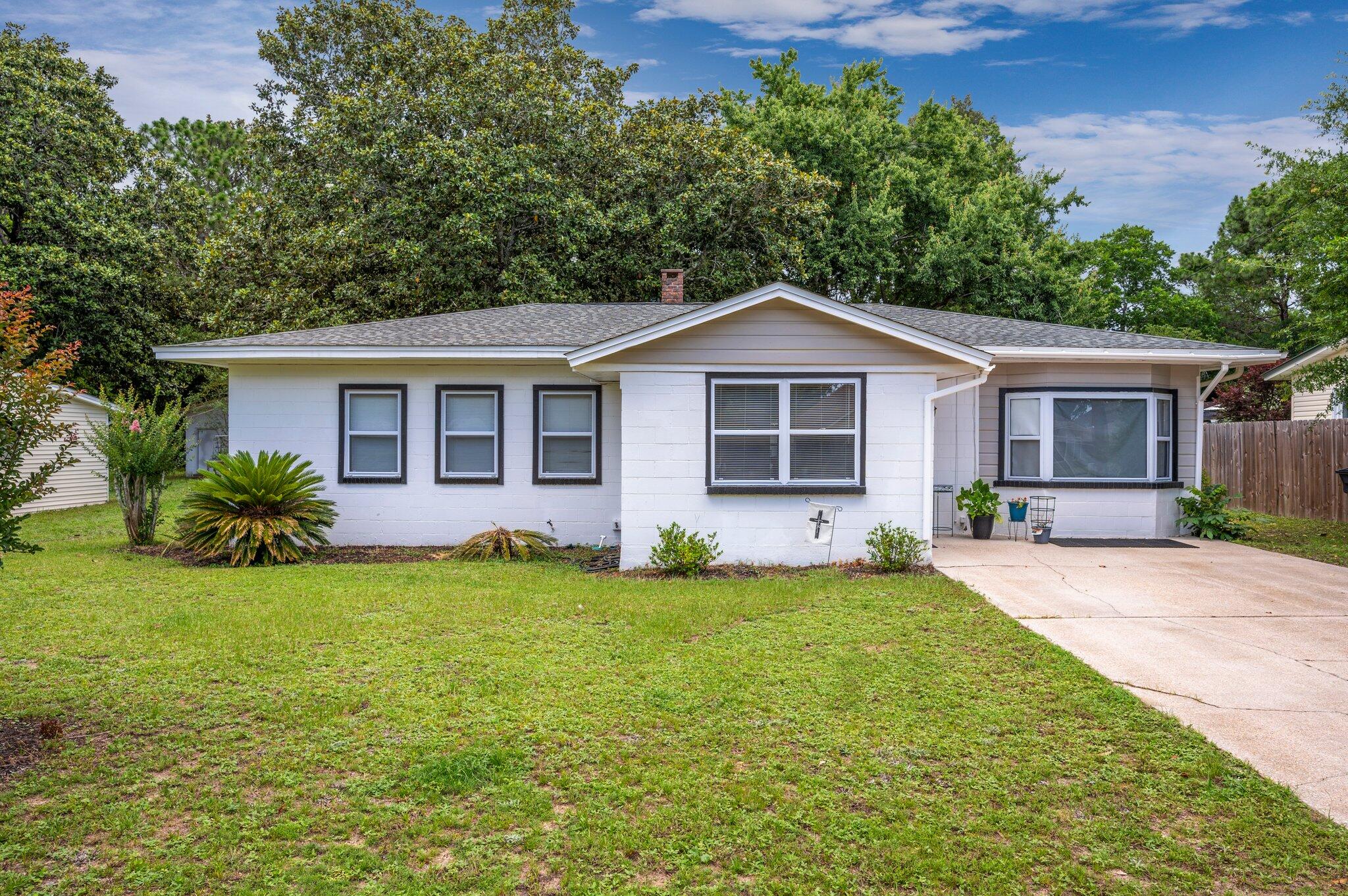 Welcome to Florida's Panhandle hidden paradise! MOVE-IN READY 4Bdr/2BA perfectly situated in close proximity to Eglin AFB and city parks, with boat ramps.  This is a renovated, split floor plan, with a newer look and open floor plan.  Plenty of office or storage space in the very large laundry room (heated & cooled) as well as additional living space in the heated & cooled Florida room.
Renovations in 2020 included new roof, plank flooring, carpet, lighting, vanities, granite counter tops, water heater, upgraded electrical (including the panel).  Call you favorite real estate professional for a private showing of this beautifuly updated home in Valparaiso.
