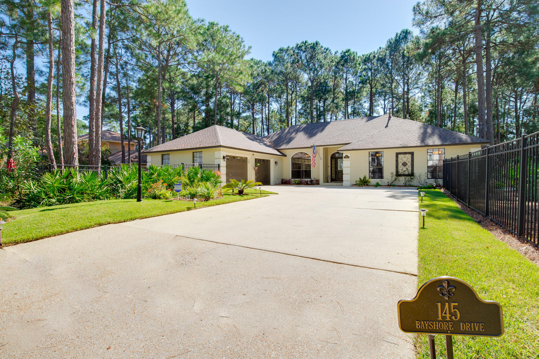 Immaculate, fully-upgraded, single-story 4/3 custom brick home with no HOA and TWO Master Suites! This home has been completely renovated over the last 2 years with almost $200,000 in updates - new roof, HVAC and water heater. Pristine kitchen with chef quality gas cook top, Bosch dishwasher, stainless appliances, Quartz countertops and Travertine floors throughout - Just across the street from the Bay! Beautiful landscaping with a gentle water feature and fountain. Backyard borders park creating a very private back yard area great for entertaining! One block from Legion Park and public boat ramp makes this home perfect for the boat enthusiast! It's spotless & ready for immediate move-in! Check it out today!