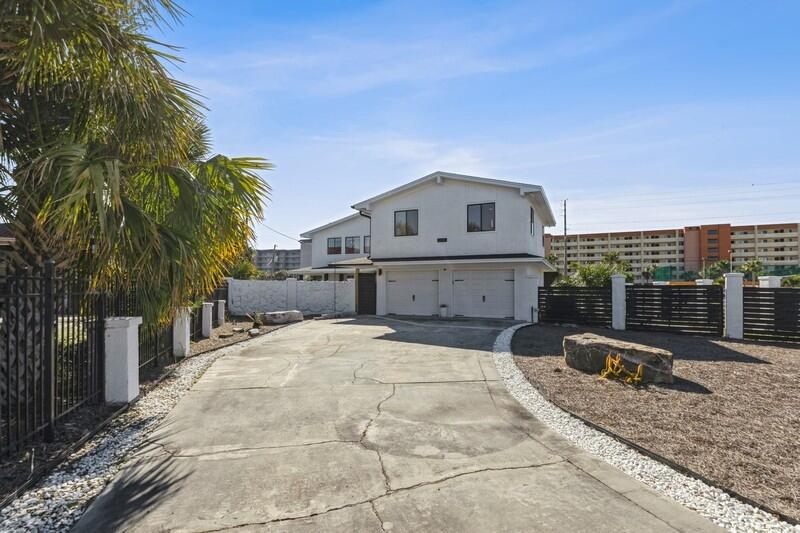 Discover coastal living at its finest in this spacious four-bedroom, three-bath haven at 504 Dory Ave. on Okaloosa Island. Just minutes from the pristine beaches, this residence offers a perfect blend of comfort and convenience.

With a generous 3,309 sq. ft. of living space and situated on a sizable .33-acre lot, this home provides both room to roam and a serene retreat. The well-designed layout includes a two-car garage, ensuring both functionality and convenience for your lifestyle. Immerse yourself in the island lifestyle with seamless access to the nearby beaches, creating endless opportunities for relaxation and recreation. Whether you're entertaining guests in the open living areas, enjoying quiet moments in the bedrooms, or taking in the coastal breeze in the space backyard, this property embodies the essence of beachside living.

Don't miss the chance to make 504 Dory Ave. your coastal sanctuary a place where the sun, sea, and spacious living converge to create a truly remarkable island home.