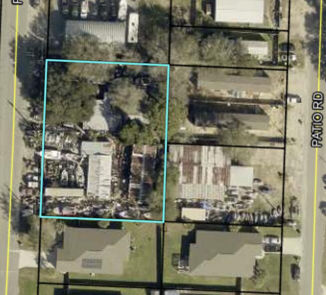 one half acre parcel located right off of Racetrack Road across the road from Pryor Middle School, zoned service shop, has been used as a lawn mower repair shop, owner is moving and in the process of cleaning up now, great location consists of 2 buildings a 1300 sf shop and a 1400 sf house