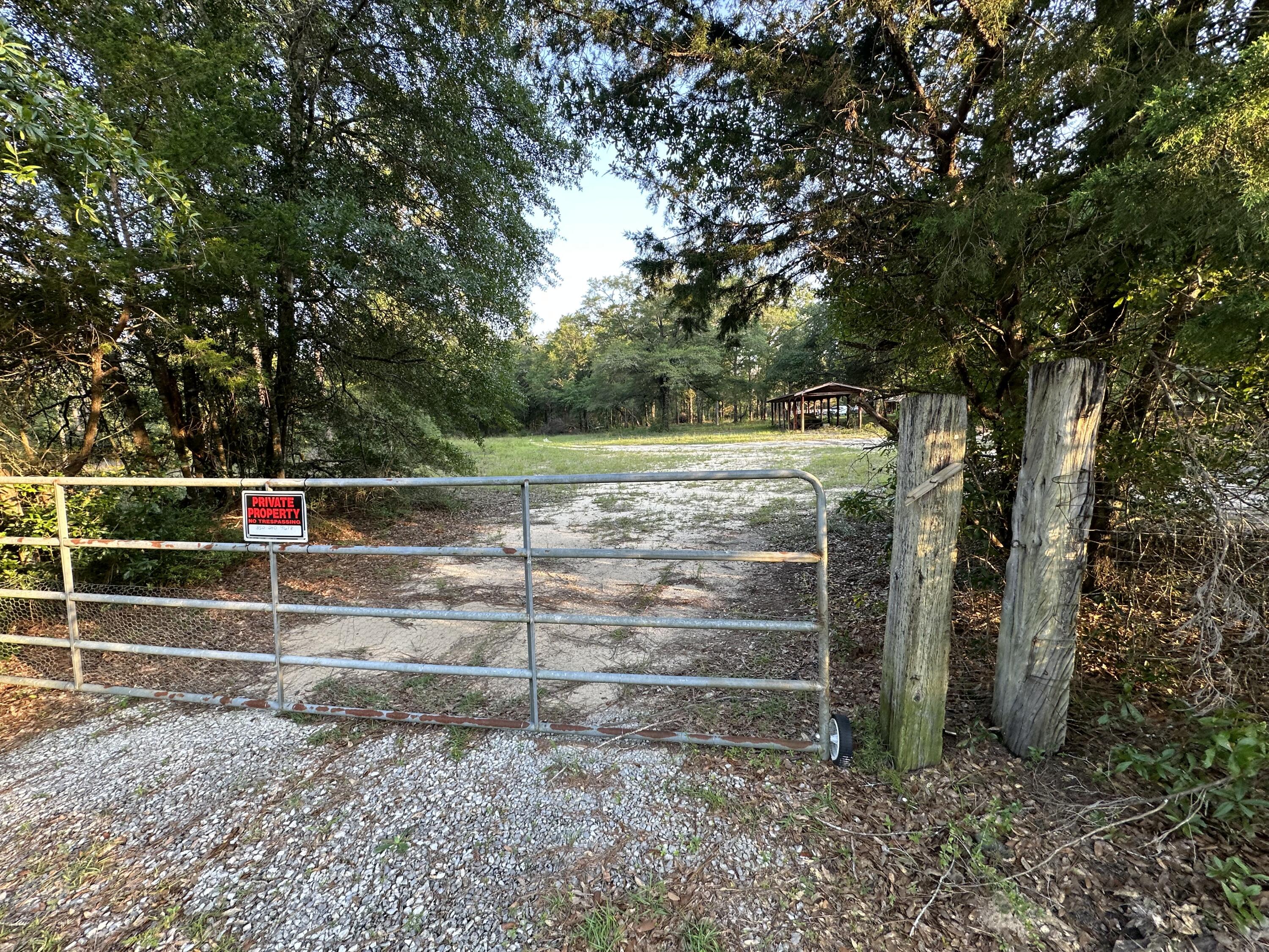 Its time to settle down! Bring your build plans today! Cleared out front with power and water available!
This 10+/- Acres of Prime Land has about  170 Ft of road frontage and is county  zoned as Agricultural. Easy access to Hwy 393, Hwy 188, and hwy 85 giving various options for local Beaches, shopping centers and restaurants.