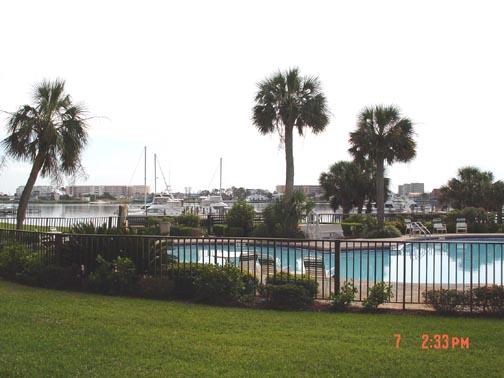 A Beautifully Updated, and Very Nicely and Fully Furnished Waterfront Studio Condo. Turn Key with everything needed to continue as a Vacation Rental, or Use as a Family Get-a-Way.. OR BOTH.. Or even a Long Term Rental. This Unit comes with your very own Assigned 40ft Boat Slip, #C19, which has Shore Electric and Water access at the Slip as well.
Pirates Bay welcomes Owners and Guest to the facilities that includes two of the largest
and most beautiful Pools in the local or surrounding areas. They are located right on the waterway. Also a BBQ area with Picnic Table.. Feel free to walk the 121 Boat Slip Marina area, getting some excercise in, while enjoying the Waterway. Watching the Dolphins swim by, and especially enjoy the Fantastically Beautiful Winter Sunsets right on the Water. Both Buildings of the Complex have just been through a Complete Exterior Restoration and very nicely updated overall.  Other major components in the complex have been updated as well, such as the Pools, the Grounds, Walkways, Sea Walls, and much more.  Some work can be seen as still in progress, but should be completed by the end of July.   

Buyer should verify room measurements as the are estimated and do vary somewhat in each condo, as the buildings are built in a curved fashion.

Association dues of $459.00 covers the following:  Water, Sewage, Trash, Quarterly Basic Pest Control, Cable TV with 2-HBO's, Hi-Speed Wireless Internet, Insurance on the Buildings Structures Fire, Flood, Hurricane, etc), All Insurance coverage's required by the State of Florida as to Condo's,  This includes the $326.00 for the Condo, and the $133.00 for each Boat slip assigned to the Unit.  Dues are monthly amounts, but to be paid quarterly, the 1st of each quarter.

DON'T HESITATE, as this unit won't last on the market long..  Buy now, you'll be glad you did.. Enjoy the First Floor, walk right out to the Pool, the BBQ, the Marina, and the parking area.. never worry about an elevator not working..!!  the New Laundry facilities are located on the 2nd and 3rd Floors for your convenience. The Ice and Soft Drink Machine Room is located on the Secured First Floor area.  and Yes, you even have your own on-site Mail Box for personal delivery on the first floor by the elevator.