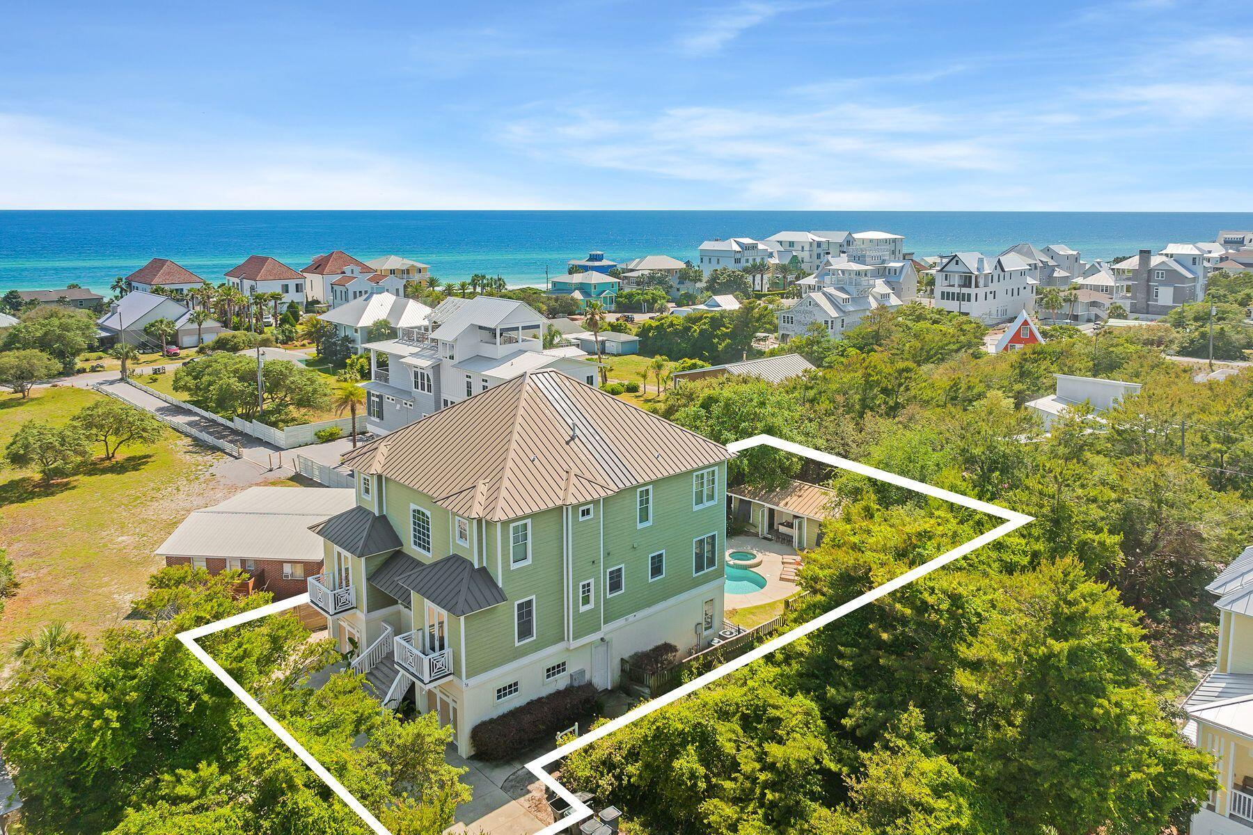 Under contract receiving back up contracts until 6/16/22. Presiding over a generous 0.23-acre lot south of Highway 98 in beautiful Inlet Beach, ''Mara Vista'' is your next dream come true. This commanding 5,076sf three-story beach house boasts a beautiful private pool with guest house and amazing gulf views. It's just a five-minute walk from sand and sea. The private fenced lot provides ample space for alfresco entertaining and spending quality time together. This beach house makes the perfect base for groups, weddings and family gatherings. When not occupied by the owners, it has earned its keep generating an impressive rental income with projections of more than $265,000 and upwards of $350,000 with a full update. Designed to sleep 19 guests,  all seven bedrooms with en suite baths, open to large porches or pool deck providing quiet private space on all levels. The pool house includes a delightful one-bedroom guest suite with nano doors that opens to the pool, a well-equipped kitchen and private en suite in addition to the pool bathroom. Surround sound indoors and out provides background harmony as you relax on the shady terrace. The impressive pool and spillover spa are the main talking points on the first floor while the upper floor balconies offer stunning gulf views and breathtaking sunsets at cocktail hour. The second floor is the living and entertainment area with gleaming hardwood floors throughout the expansive open living space. The chef's kitchen is superbly appointed with a large island, granite counters, stainless appliances and a Wolf gas range to take care of snacks, lunch and large-scale dinner parties. The ice machine and wine cooler keep everyone plied with snacks and icy drinks. The great room is designed to host sizeable gatherings along with a spacious dining area and second master suite. Ride the elevator to the third floor where another magnificent master suite awaits complete with balcony and porch swing. Where better to relax and appreciate the pool and gulf views at sunset? The luxury suite includes a steam shower, jacuzzi tub and a sitting area with its own wet bar and wine cooler. Two separate garages provide cover for vehicles, beach toys and golf carts with additional parking outside. Look forward to bike rides along 30A to shops, restaurants and lunch rendezvous in Rosemary Beach and 30 Avenue, less than half a mile away. The best part, you're only a quick walk or bike ride to the white sandy beaches and emerald waters of the Gulf of Mexico. Photos of the white and sea glass exterior of home and master suite are renderings only and showcase what this beautiful home could offer with a few tweaks. Seller is providing a $20K credit for exterior paint with acceptable offer.  Buyer should verify all data and dimensions if important.