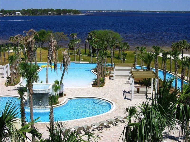 Big Water View and easy access to Lazy River pool make this wonderful condo a great place for family vacations. Use the sky bridge for a quick stroll to the Beach. Take advantage of high $$ seasonal rentals $$ when you're not in town. This highly desirable resort is close to many fun attractions and restaurants. Move in ready and stylish decor. Top of the line amenities. Buyer to verify all information.
