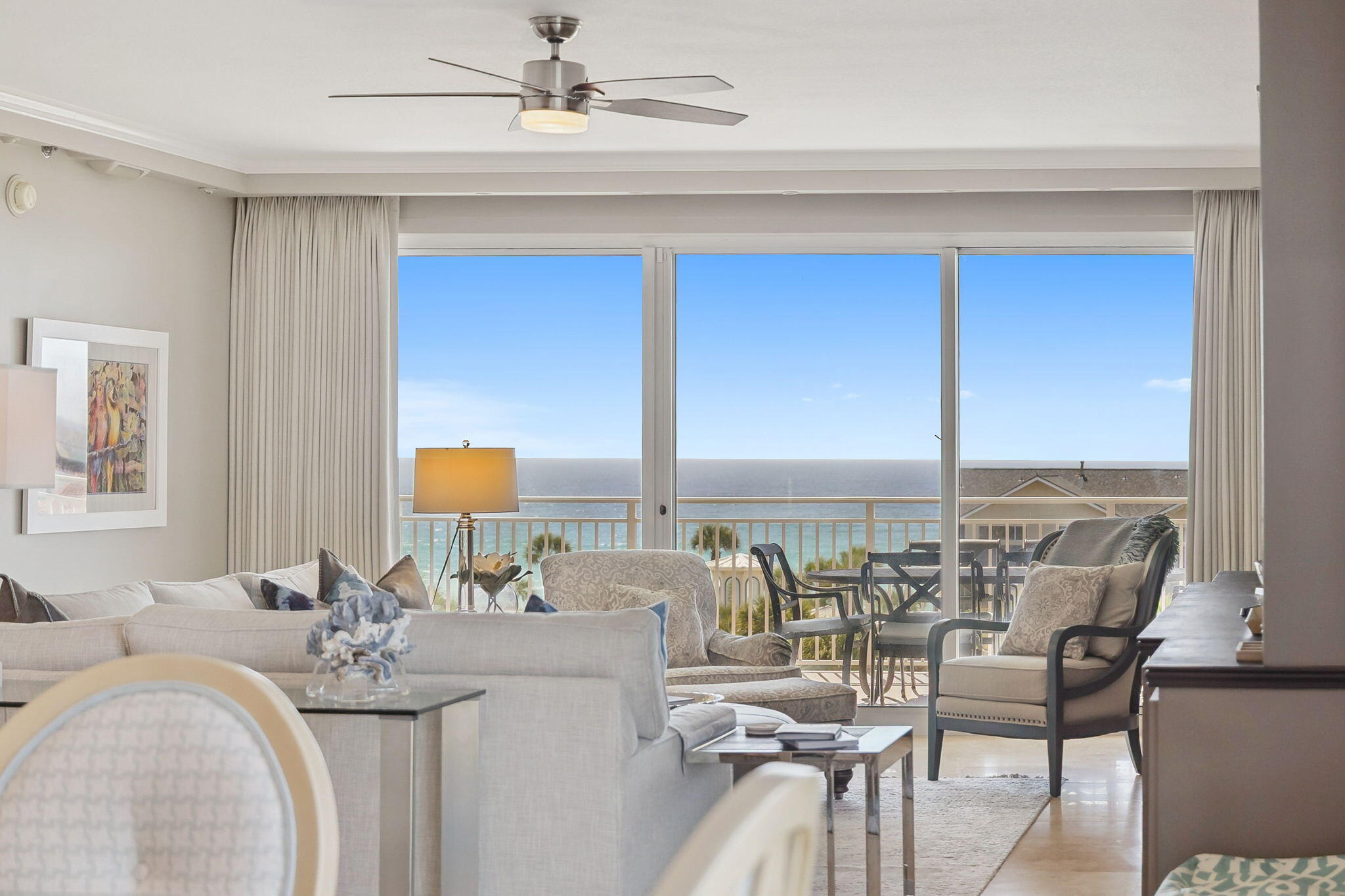 Located in one of Destin's most desirable resort communities, Sterling Shores 519 is a beautifully renovated three-bedroom, three-bathroom residence that has never been rented and is offered fully furnished (with exclusions). The versatile lockout floor plan allows the property to be rented as a one-, two-, or three-bedroom unit, offering exceptional flexibility and rental potential.

Unit 519 is positioned on the far west side of the building as a desirable end unit, offering unobstructed western views and breathtaking sunsets through the dining room's floor-to-ceiling windows. The chef's kitchen features Thermador appliances, modern cabinetry, quartz countertops, and a sleek tile backsplash, opening into a bright open-concept living and dining area designed for effortless coastal living. The living room and primary suite both open to a private balcony overlooking the lagoon-style pool with Gulf views.

Additional features include a dedicated laundry room with full-size washer and dryer, motorized hurricane shutters for convenient push-button storm protection, two deeded garage parking spaces, and a private storage locker.

Sterling Shores offers 400 feet of beach access and resort-style amenities including a 4,300-square-foot zero-entry lagoon pool, a beachfront pool with tiki bar and grills, a state-of-the-art fitness center, and a private theater room. Whether you're seeking a luxury coastal retreat or a high-demand investment property, this exceptional residence offers the perfect blend of location, lifestyle, and long-term value.