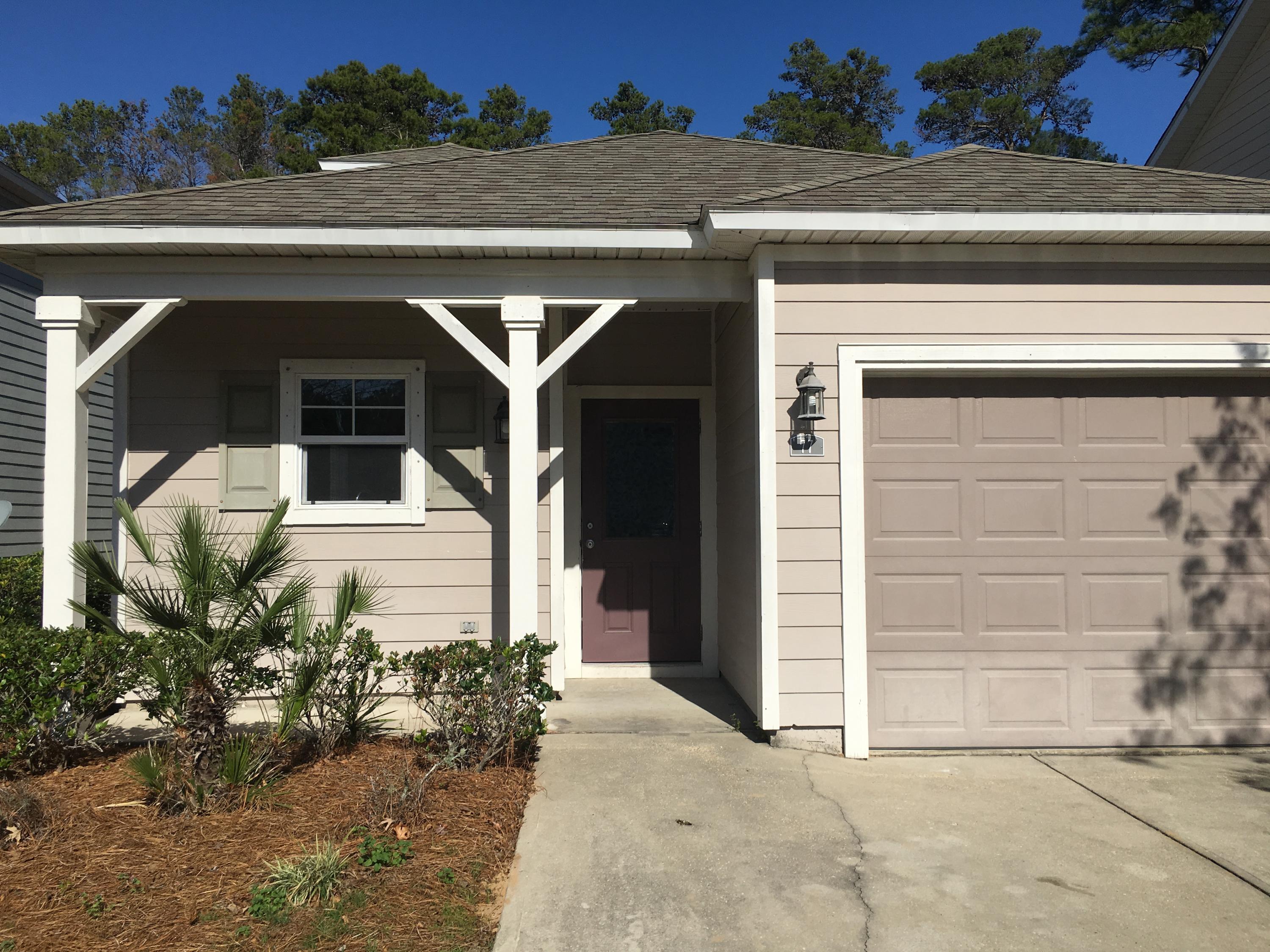 This is the Georgian plan at the family friendly community of Plantation at Santa Rosa. The master suite and a guest bedroom and bathroom are on the ground floor with an addition bedroom and full bathroom upstairs. Upgraded designer selected 18'' tile is throughout the downstairs living room, dining room, and kitchen. The kitchen has beautiful cabinets with stainless steel appliance and plenty of counter space with the elegance that you only find with granite. You will enjoy this Florida cottage and the quiet neighborhood, but you will enjoy the location more! You are minutes away from the shopping and restaurants at Grand Boulevard, the World famous beaches of scenic highway 30a, the beaches of South Walton, Top Sail state preserve, and community services.
Sorry no pets
