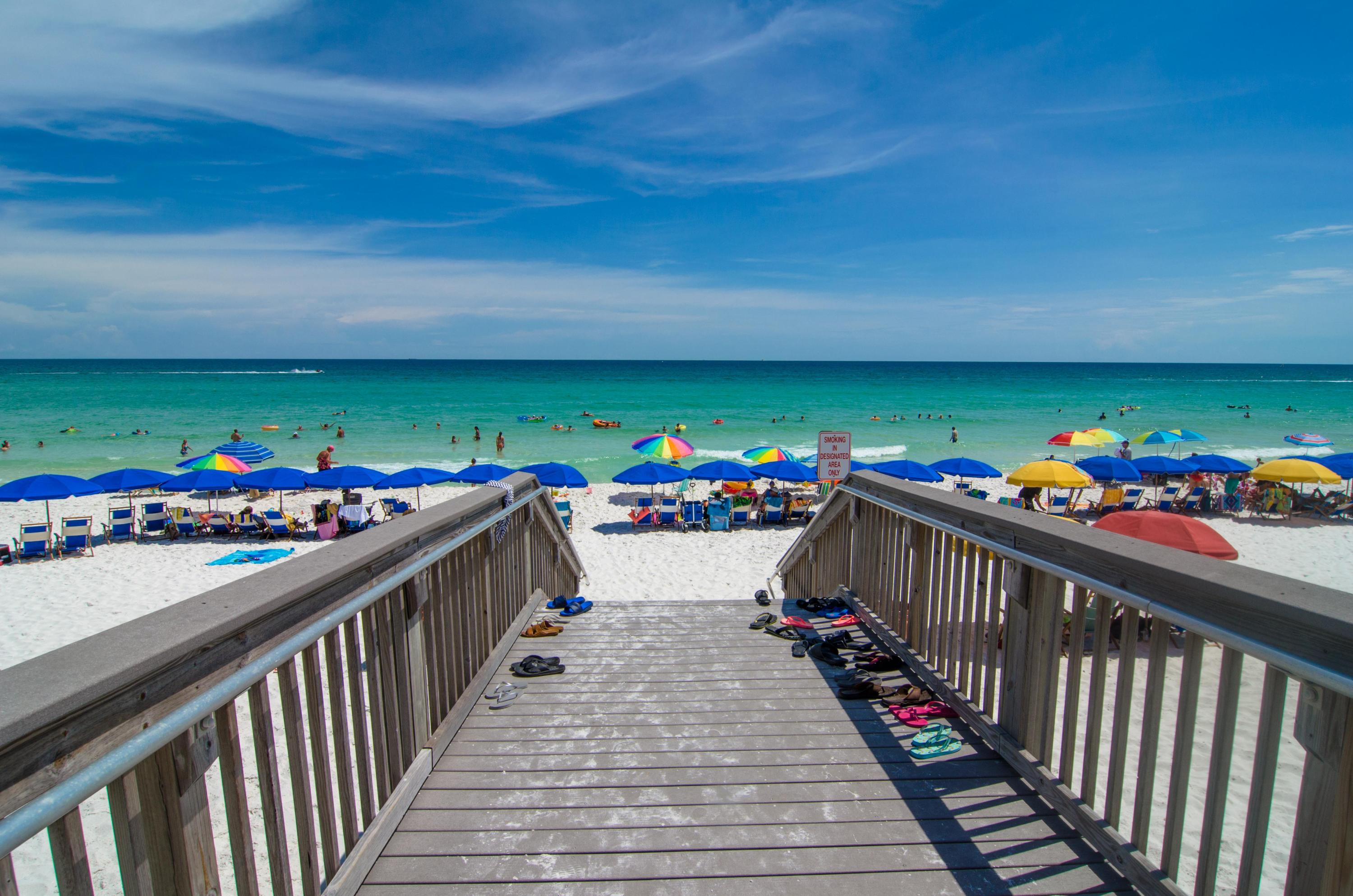 27K+ Rental Projection(See documents)!
Step inside this ground floor, quaint 1 bedroom condo located just steps to the white sands and the Gulf of Mexico. No waiting for elevators, just open up your patio door and walk across the green space to the beach boardwalk! Enjoy beautiful Gulf views from this condo featuring tile throughout- ideal for rentals. Holiday Surf & Racquet Club has tennis courts, shuffle board, boardwalk, his and hers exercise rooms, beautiful lobby, landscaping throughout the complex and game room! Do not miss this on this condo with fantastic rental potential!
