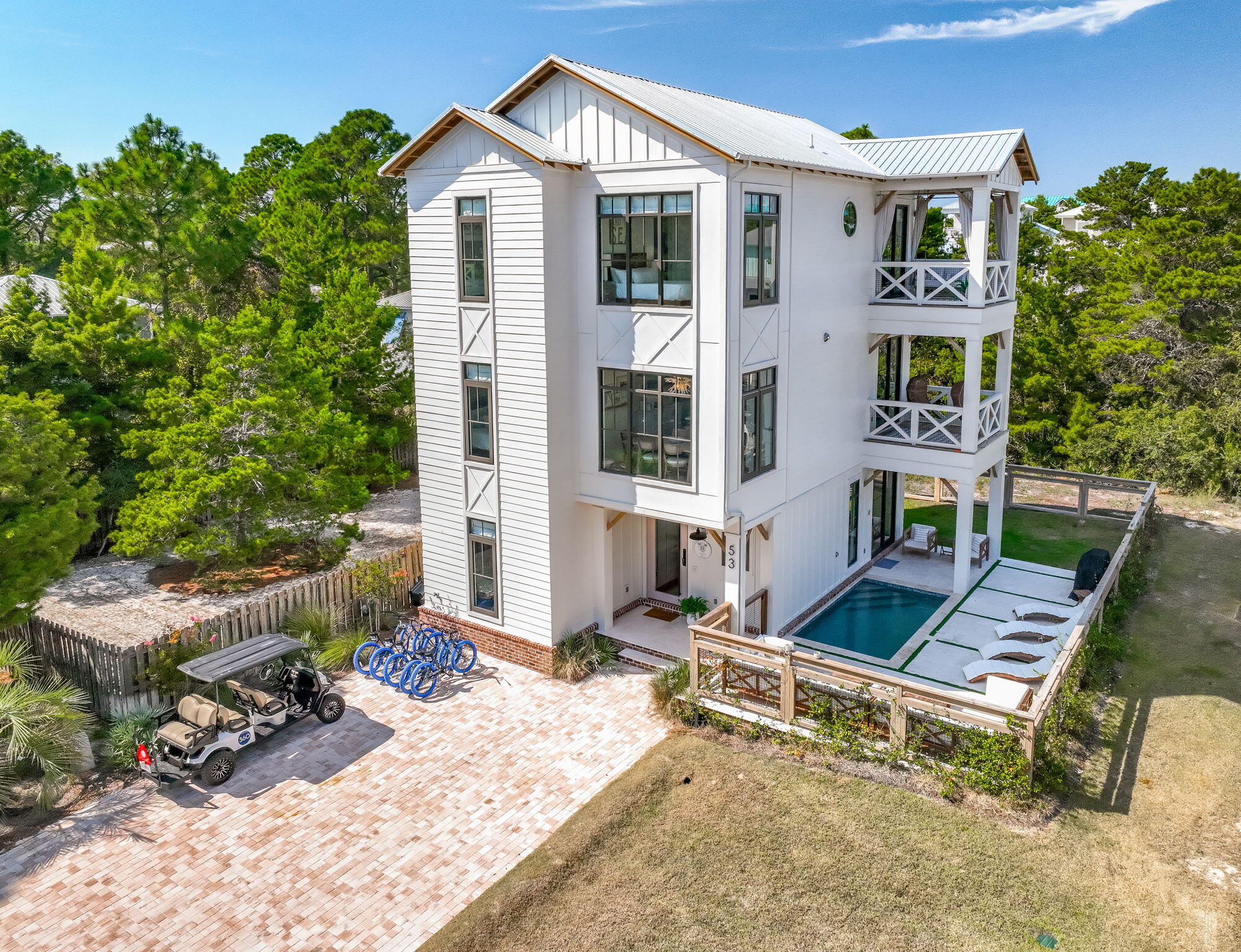 The motivated seller just adjusted the list price down $51,000. Nestled in the prestigious enclave of Blue Mountain Beach along the iconic 30A, 53 Porpoise Street is a recently constructed (2023) masterpiece of coastal elegance. This beachside haven offers the pinnacle of seaside living with a private pool, designer furnishings, and an enviable location just minutes from the sugar-white sands and turquoise waters of the Gulf. Step inside and discover interiors that blend elegance and comfort with ease. From the open living spaces to the beautifully appointed bedrooms, every detail has been thoughtfully curated with high-end finishes and carefully chosen furnishings that capture the spirit of coastal living. This is a home designed not just to be lived in, but to be savored. Your private outdoor oasis awaits. Lounge in the sun by the sparkling pool, share alfresco dinners in the courtyard, or host unforgettable gatherings under the stars. Whether you're taking a refreshing morning swim or enjoying a tranquil evening soak, the poolside retreat promises endless opportunities for relaxation and celebration.
Beyond your doorstep, the best of 30A living surrounds you. Explore charming boutiques, bike along scenic coastal paths, indulge in world-class dining, or set out on endless adventures beachcombing, paddleboarding, kayaking, and more. Blue Mountain Beach is a vibrant mix of natural beauty and coastal culture, and this home places you at the heart of it all. Restaurants and bars in Blue Mountain Beach include Red Fish Taco, Cowgirl Kitchen Market & Cafe, Basmati's Asian Grill, Blue Mountain Bakery, The Perfect Pig, For The Health Of It, and Blue Mountain Creamery for ice cream. Other nearby options include M&P, Mimmo's, and Stinky's. This is more than a beach house; it's a lifestyle. With its prime location, captivating design, and private pool, 53 Porpoise Street offers a rare opportunity to own a brand-new residence in one of the most sought-after communities on Florida's Emerald Coast.  Call your agent to arrange your private tour today and experience the essence of coastal luxury.