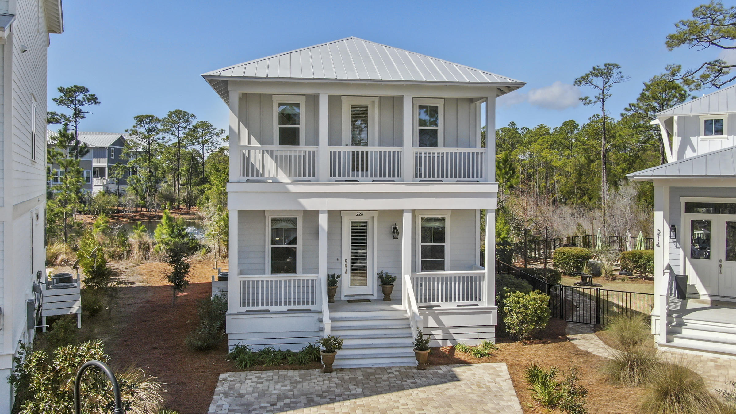Walk to the Beach in 10 Minutes from this Pristine 3 Bedrooms, 2.5 Bath Beach house. This home is Move in Ready, has never been rented and is offered fully furnished. The home Features gorgeous hardwood floors, an abundant amount of Natural Light, Granite counter-tops and Vanities, Open Floor Plan, tile Backsplash, Quality Stainless Appliances, Gas Range, Tankless Water Heater, Separate Built-in oven and Microwave, A Huge Master Bedroom with a splendid deck and a generous Master Bath with a lovely Walk-in tile Shower and Plenty of Closet and Storage Space. Outside there are 3 Covered Porches one screened-in for Enjoying the outdoors, Decorative Paver Walk-Ways Sitting Area and Parking area. An automated irrigation system makes maintenance a breeze. Highland Park is perfectly located in Blue Mountain Beach between
Grayton Beach and Gulf Place. Away from the busyness of the east end of 30a, but with easy access to the beach, fine restaurants and shopping. The Neighborhood features Decorative Paver Roads, Sidewalks, Landscape entrance and a Grand Community Pool. This home is one of the Best Values on 30a. Call your agent to schedule a visit today. All ages Measurements and room sizes are approximate. Please verify if important.