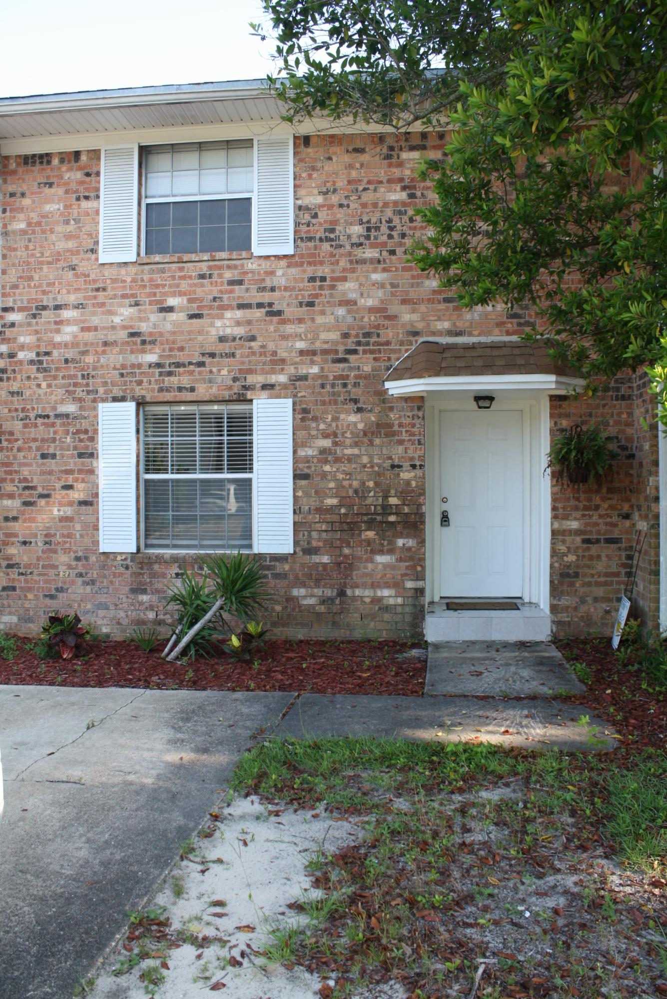 This 3 bedroom, 1.5 bath home is nice inside and out! Downstairs rooms, which include, living room, dining room, kitchen, and half bath, all have tile floors, and are open and light. The downstairs bath has a new vanity and mirror. The kitchen has a breakfast bar that overlooks the dining room. Appliances feature side by side fridge with water and ice in door, glass top stove/oven, dishwasher, microwave, and garbage disposal. Upstairs boasts 3 bedrooms and a full bath. The master bedroom has a large walk in closet with shelving system. All three rooms have ceiling fans. The upstairs bathroom has tile floors, and remodeled vanity. Backyard is completely fenced and has a large covered deck to enjoy the outdoors. Storage shed and washer/dryer top this property off!