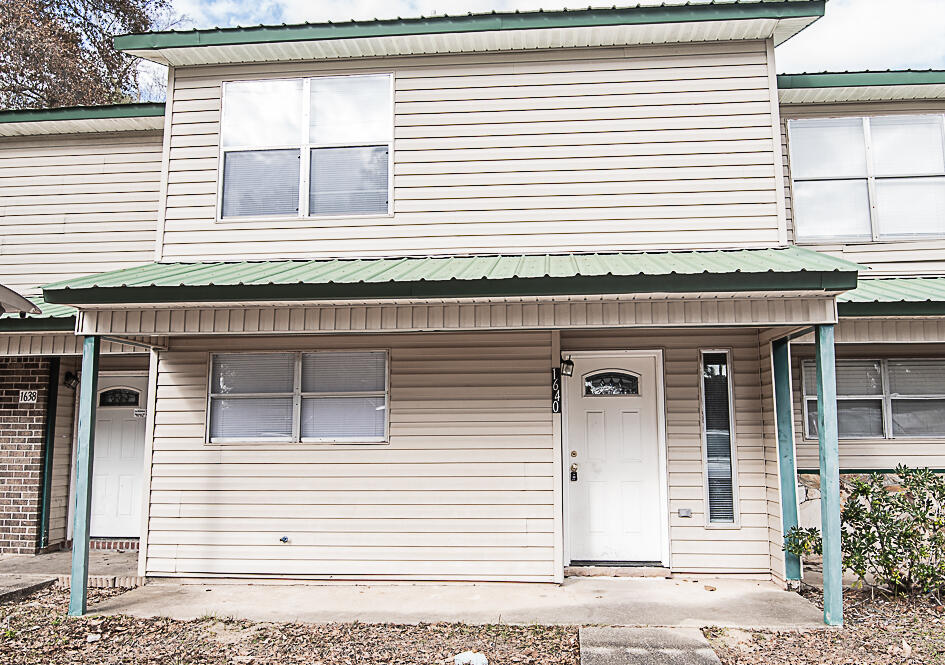 Available now, Located in the heart of Crestview, this 3 bedroom, 1 1/2 bath townhouse has been renovated.  New paint and flooring.  Covered front porch and back porch with a fenced in back yard and storage area. Kitchen, living, dining, laundry and 1/2 bath downstairs.  3 bedrooms and 1 full bathroom upstairs.  Very roomy and lives large.  Nice exterior features with plenty of parking and easy commute to bases, beaches and shopping.  No inside smoking and no inside vaping.  Pets will be allowed with a $400 non-refundable pet fee and owner approval.
