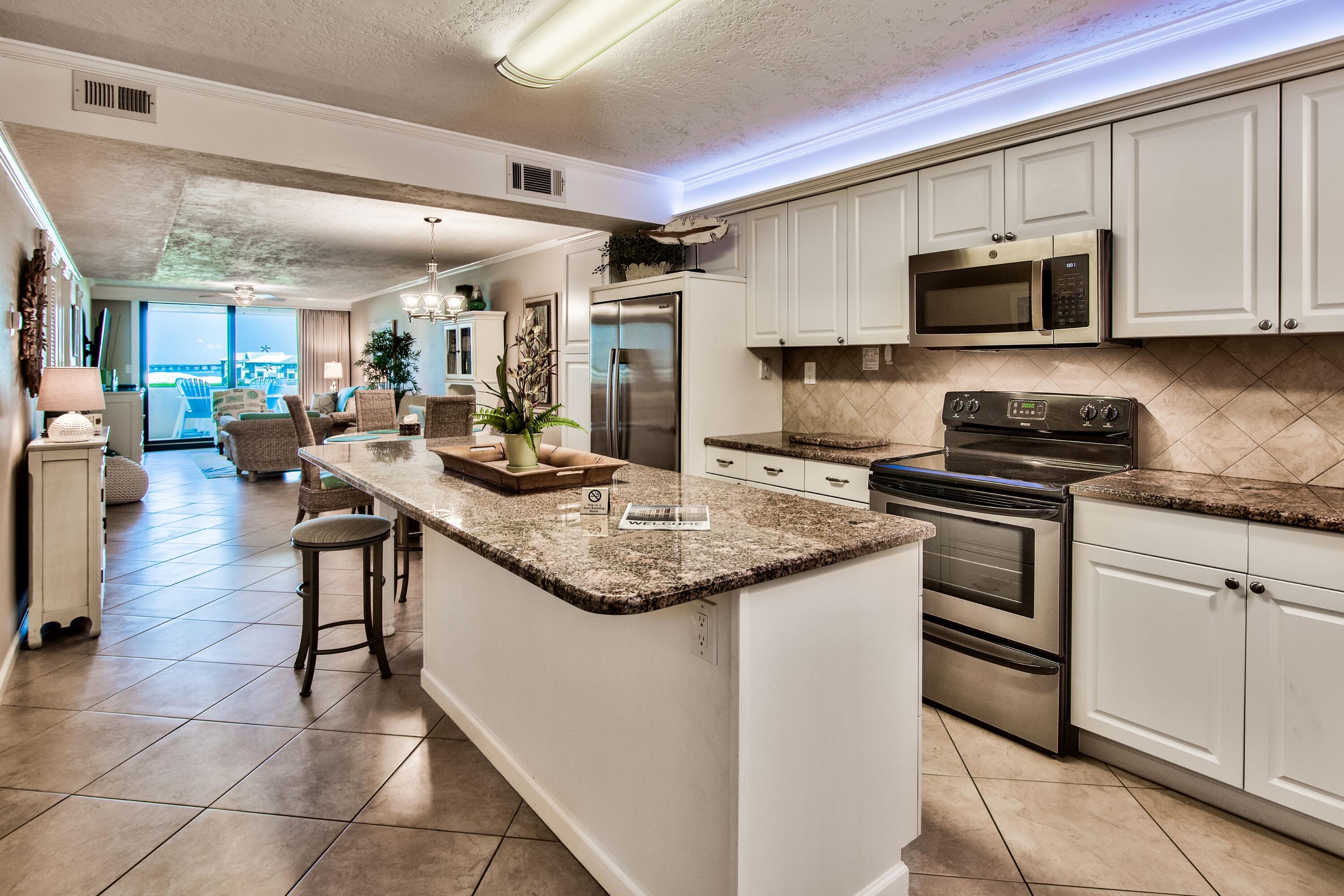 Only 12 - 1-bedroom large units in Jetty East.    Enjoy Gorgeous Views of the Gulf of Mexico, Destin/East Pass, and expansive views toward Fort Walton.  Turnkey and rental ready! Money machine! Rave reviews with 5-star rating VRBO listing 1639920. Gross income 2021 $43,489; 2022 $55,863. This impeccable condo has been professionally decorated with a coastal vibe. Extra-large one bedroom, one bath condo located on the second floor. Really the 3rd floor considering the parking garage on the main level. The bathroom has a remodeled walk-in shower new in 2022. The kitchen comes complete with a large center island, granite countertops, upgraded with stainless steel appliances. The dining area comes with a table and seating for 4 with beautiful views of the East Pass through the full glass sliding door. The living room has a comfortable sofa sleeper with a 6" comfort cool mattress on a new sleeper mechanism, two side chairs, 55" high definition T.V. with cable and Wifi, new coastal ceiling fan (2022). The master bedroom features a king size bed which receives rave reviews, overhead ceiling fan, flat screen TV, and a private access sliding door to the balcony. There is also a private access to the bathroom from the master bedroom. The spacious bathroom has a new, tiled walk-in shower and granite top vanity. The in-unit washer/dryer combo is tucked away in the bathroom out of sight. The unit features an open-concept layout with an large 18x9 balcony with a new (2022) polywood counter height patio set. From the balcony you can enjoy beautiful sunsets and firework displays (seasonal). Ceramic tile throughout the main living area. New HVAC system 2019, new glass top range and microwave 2022, Nest Thermostat, LED lighting above the cabinets, sleep sofa mattress and mechanism 2022. The unit features EFCO (category4) windows. Enjoy evening sunsets and seasonal Thursday night fireworks. Great location to shopping, grocery store and restaurants. Jetty East Amenities: 900 feet of beach, 2400 sq. ft. pool with sun deck, hot tub, beach side pavilion with charcoal grills, tennis courts, pickleball, fitness room, kid's activities, music entertainment, shuffleboard, covered parking, Security & meeting room.  Financing Note:  Jetty is a Non-warrantable/ Condotel. No conventional financing