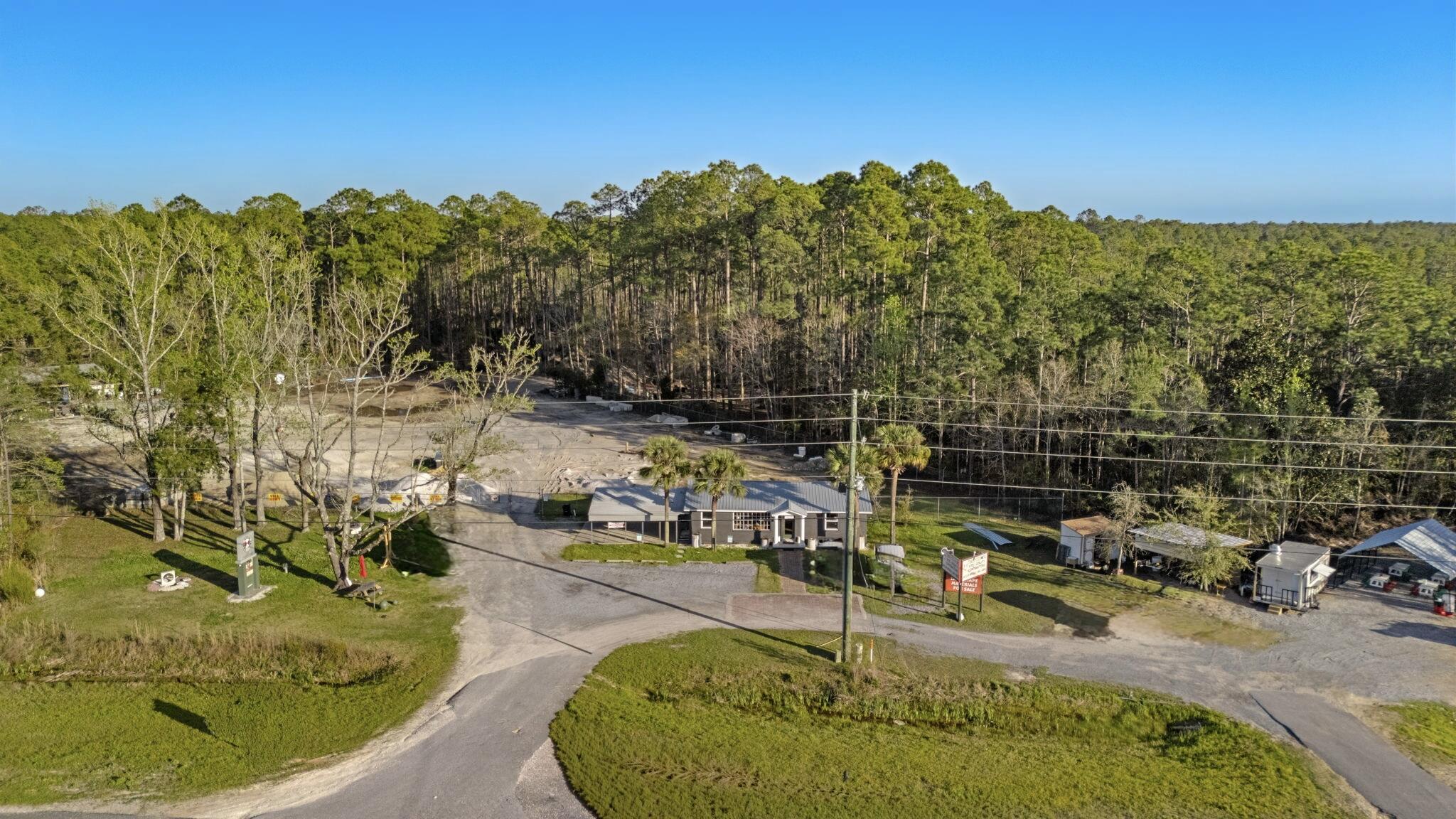 Located just north of Santa Rosa Beach, this 1.75-acre Freeport property offers strong visibility and direct access along US Hwy 331 in one of the area's few heavy industrial zones. The site includes a fully furnished office and mechanical lift, creating a functional, ready-to-use setup for industrial or service-based operations.
Its central location supports efficient movement and easy commuting--5 minutes to Hwy 20, 10 minutes to Hwy 98, and 30 minutes to Interstate 10. A rare industrial opportunity with excellent exposure and connectivity in the fast-growing Freeport corridor. Daily Traffic count of 34,000