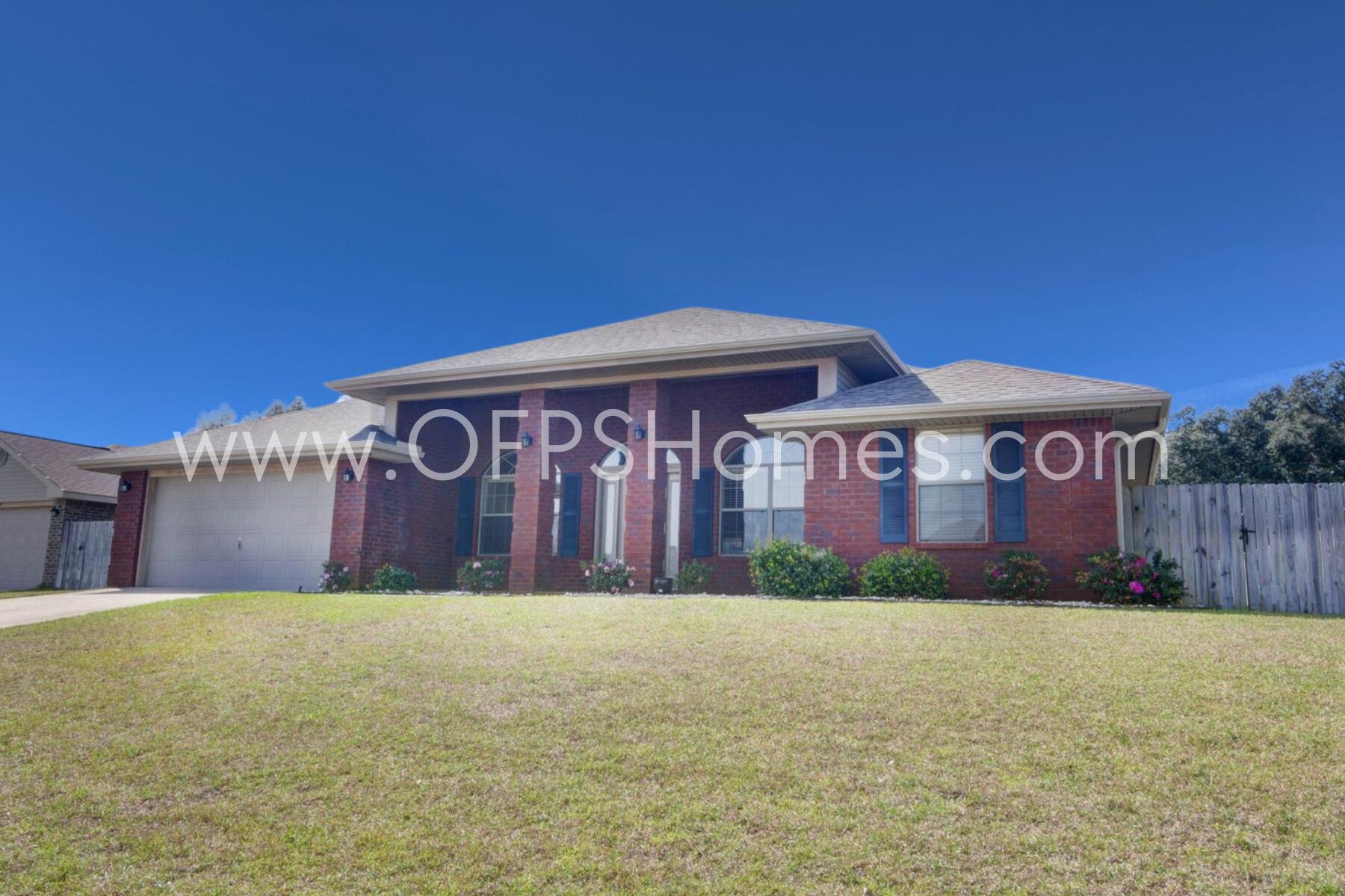 AVAILABLE NOW! This move-in-ready home offers spacious living with stunning wood floors, a tiled kitchen backsplash, and stainless steel appliances. Enjoy a cozy wood-burning fireplace. The exterior features an 8x27 screened patio, a large front porch, underground utilities, and solar panels. Extras include a home warranty, AS IS washer/dryer, garage fridge, Eufy locks, a Ring doorbell (AS IS), and an Ecobee thermostat. Conveniently located near shopping, dining, Navarre and Pensacola Beaches, and the Blue Angels show. Short commute to Hurlburt and Pensacola NAS! NO smoking. 600 minimum FICO credit score required in addition to meeting rental criteria. Pets allowed upon approval with a non-refundable pet fee and with a Petscreening.com report. All applicants are required to complete an application on PetScreening.com regardless of if they own a pet or not.  Applicants with an ESA are also required to complete the application.

** Fees Required once an application is approved include, but may not be limited to: Security Deposit, Non-Refundable Fees (cleaning and rekey), $20 Certified Mail Fee, and Pet Fees (when applicable).  **