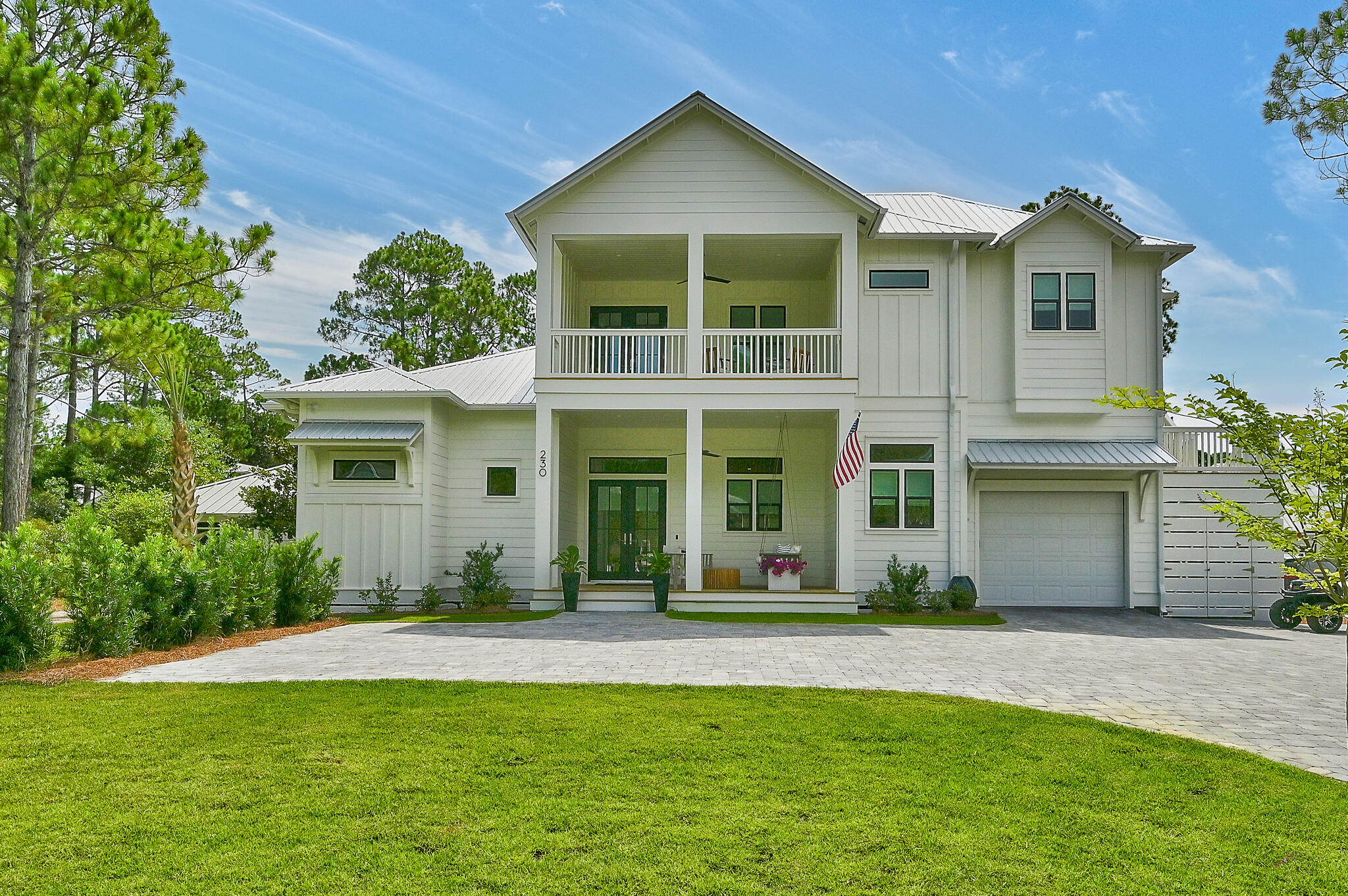 Expansive Beachside Home with Versatile Living Spaces

Welcome to 230 Wood Beach Drive, nestled in the serene neighborhood of Seagrove Beach. This spacious house boasts 3,664 square feet of thoughtfully designed living space, offering a perfect balance of privacy and connectivity to the beach. With 11 rooms in total, this residence is ideal for both primary living and as an investment property with its versatile rental options.

The moment you step into the open and inviting entry foyer, you're welcomed into a home that prioritizes both comfort and style. The gourmet kitchen stands out as a central hub, seamlessly connecting to the living and dining areas, and featuring high-quality appliances suitable for all culinary endeavors. The living room exudes a cool coastal vibe, providing a picturesque view of the large private pool.

The Master bedroom is are airy and comfortable, offering a private escape with direct access to the screened in porch and the expansive yard. The master bathroom provides ample space with thoughtfully separated grooming areas for convenience.

Adding to the property's flexible living arrangements is the carriage house, designed as spacious guest quarters. It includes a cozy living room, kitchenette, and a separate large King bedroom or access to the bunk room. The carriage house offers multiple configurations as a lockout unit, making it ideal for accommodating children, grandchildren, or a second family without sacrificing privacy.

Outside, the home doesn't disappoint. The large yard, enclosed by a tall privacy fence, ensures solitude and security, while the huge pool and sunbathing area offer the perfect spot for relaxation. The screened-in outdoor living and dining area with a summer kitchen makes entertaining effortless, no matter the weather.

The property's location on a very private dead-end cup-de-sac adds to the peace and tranquility, while still providing easy access to multiple beach entry points just a short stroll away. Seagrove Beach is known for its laid-back atmosphere and close-knit community, offering local dining, shopping, and recreational activities. With several transportation options nearby, including main roads for easy commuting, this location is as convenient as it is peaceful.

In summary, 230 Wood Beach Drive presents an extraordinary opportunity to own a versatile home in a sought-after beachside community, accommodating various living needs without compromising on comfort or potential rental income.