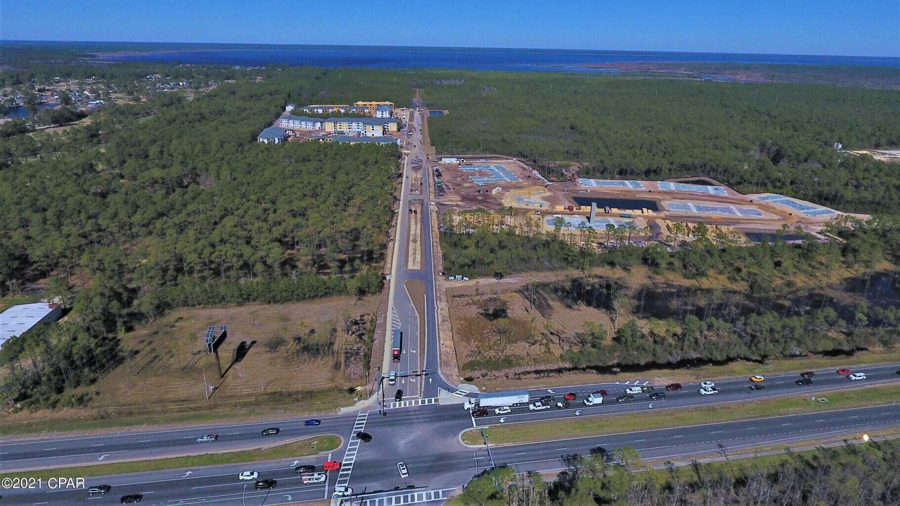 124 Acres on West Bay in Panama City Beach - ''The Oak Grove on West Bay''. Located on the east-side of Colony Club & Trieste neighborhoods & the Holiday Golf Course. Over 1,200 feet on West Bay with expansive views across the Bay. It is comprised of 3 parcels; A=59.9 Acres on West Bay, B=60.1 Acre interior parcel and C=4.4 Acre parcel on West Bay and accessed via Moonlight Bay Drive. The primary access is via the Clara Avenue extension, which is a 100' right of way, now paved close to the south property line. The site has been annexed into the City of Panama City Beach & zoned P.U.D. & Conservation. The highest-and-best use is residential &/or resort. Conceptual site plans, surveys and maps are attached. Call for detailed information & to setup a tour.