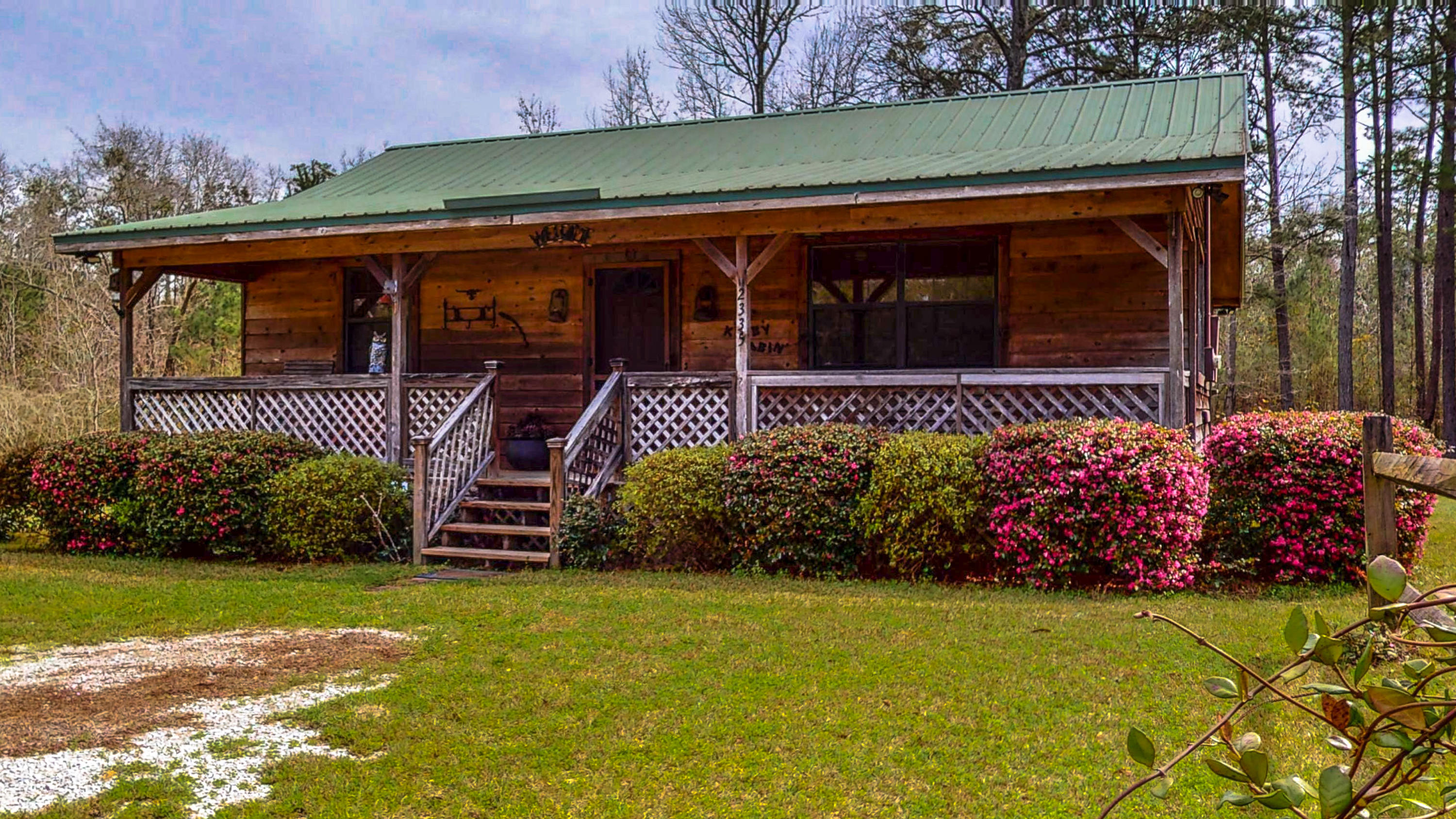 Rustic cedar sided cabin that is fully furnished and sitting on 3.5 acres on a paved county road! Peaceful country surroundings, but located just outside of the city limits and less than 5 minutes to everything that DeFuniak Springs has to offer! This property has been better than well maintained and is ready for you to make it your home for the next year! One year lease, background and credit check required! Lawn maintenance is included!