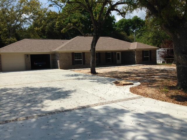 BRAND NEW! Beautiful family sized brick home with all the bells & whistles of a much more expensive home. A few of the features include an open floor plan, stainless kitchen appliances, granite counter tops, wood look tile flooring in main living areas, separate laundry room & new washer/dryer, double vanity & separate walk in shower in master bath, spacious guest bedrooms, oversized 2 car garage and extra large fenced back yard. Owner will consider dogs (no cats)with a refundable pet deposit and a non-refundable pet fee. NO smoking! Any person 18 years old or older must complete separate applications. Call to schedule a viewing of this fine home.