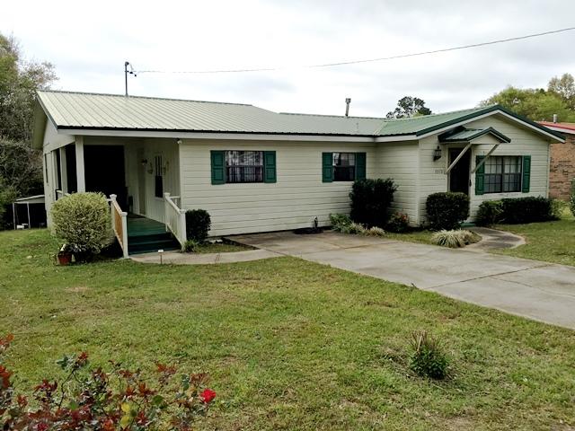 This charming home has 2 bedrooms and one bath, but it has an extra large dining room, formal living room and a bonus room that could be used as a study, play room or den. The kitchen has plenty of cabinets and newer appliances and there's a large laundry/storage room. There is a solid oak dining room set that may be utilized if needed, as well as an entertainment center. They can be removed if tenant has their own. The exterior is completely fenced and there is a storage building and lean-to for lawn for your extra things. Pets will be allowed on a case-by-case basis.