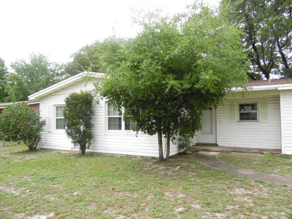 With a little love this 3 bedroom, 1 bath REO home in Fort Walton Beach would be the perfect year round residence or rental investment property. The home features a cozy kitchen, sunken dining room and a wooded beautiful back yard. The location is super convenient to shopping, schools, restaurants, Military Bases and employment opportunities.