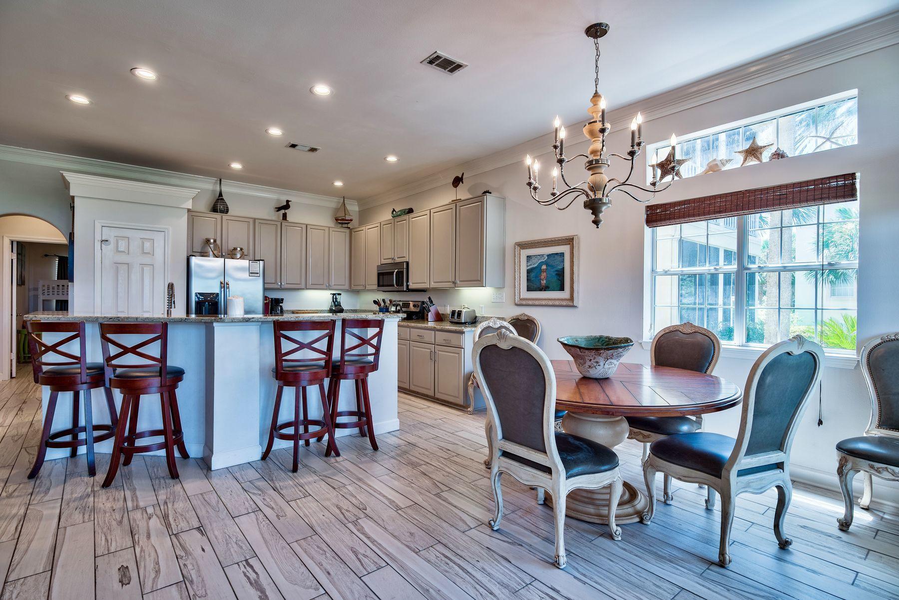 5274 Tivoli Way is a gorgeous three bedroom, three bath coastal town home located South of Highway 98 in the immaculate gated community of Sandestin. This ground floor unit has been fully updated throughout to give it the unique coastal charm that is well suited for a primary, secondary, or investment property. Rental history for 2018 exceeded just over $53,000 (gross annual income) and is on track to do so for 2019. Updates to this unit include fresh paint, new flooring throughout the entirety of the unit, renovation of the kitchen to create a completely open floor plan throughout the main living area, all new appliances and granite countertops throughout the kitchen and all three the bathrooms. In addition to the updates to the unit, the exterior of Tivoli was painted in early 2018 and new roofing was completed in 2016.
5274 Tivoli Way is conveniently located on the ground floor, which is highly desirable in the community of Tivoli due to the ease of ingress and egress compared to the higher floor units. Another great perk of having a lower floor unit is that the unit sits directly on the golf course and has incredible views of Sandestin's beautiful landscaping, fairways and greens. This unit is only steps from the Tivoli swimming pool.
Sandestin is an incredible resort community complete with many world class amenities which include private deeded beach access, multiple pools & golf courses, day spa, a fitness center, tennis courts, shopping, fine dining experiences and there are numerous recreational activities including kayak rentals, bike rentals, walking/running paths and a tunnel to cross highway 98 safely to the Bay side, where The Village of Baytowne Wharf is located. There, you will find plenty of kid friendly activities, live music, full service marina, restaurants and night life. Sandestin hosts numerous festivals throughout the year as well. You also have access to the shuttle system that operates throughout the community on both the north and the south end.