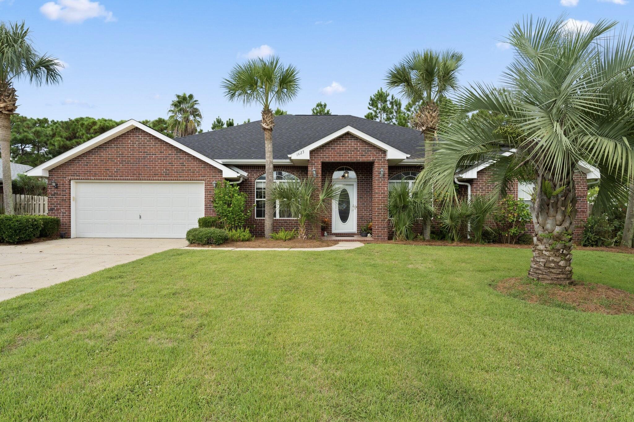 *OPEN HOUSE Sept. 17 & 18 from 12-3pm!*  This lovely 4 bedroom 3 bath POOL home has a NEW ROOF (2021), NEW CARPET (2022) and a NEW HVAC with a UV light air purifier (2022). The home is spacious with a split floor plan located in the desirable neighborhood of Woodlawn Heights. Upon entering the foyer the living room is to the right with the formal dining to the left. Continuing on you'll see the large great room, high ceilings and the kitchen with an eat at bar and breakfast nook. You'll love overlooking the enclosed pool and fully fenced lawn. Entertaining will be a breeze with this layout and nice covered patio area. As a bonus, the back bedroom has it's own bath that opens to the pool, hot tub and patio area. The master bedroom and bath are both very roomy, and the closet is massive..>>> The seller has done an incredible job maintaining and completing so many upgrades making this the perfect turn key home for the new owners. In addition, the fence is only 2 years old, and the pool heater, fireplace and water heater are all gas. The two car garage has a Tesla EV charging station.  Living in Woodlawn Heights gives you access to "A" rated schools, sidewalks, streetlights, underground utilities, a playground, pavilion and boat/RV storage. You'll only be a few minutes away from Woodlawn Middle School and The Eatery, a family-friendly food truck patio with interactive games and a variety of food choices. The Woodlawn Beach Boat Ramp is a short 4 minute drive away!