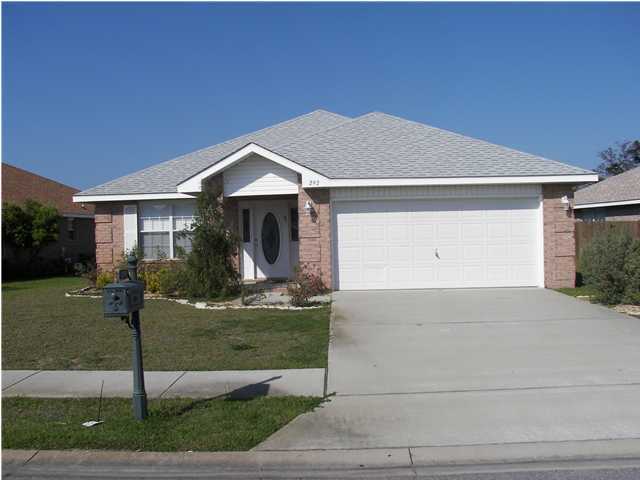 Live at the beach! Walk to deeded Beach access! Fresh Paint and New Appliances! 4BR/2BA all brick home in gated Paradise Retreat close to the beach! Lawn Maintenance included! Spacious and inviting, this home is a split 4 bedroom plan with 2 baths. Formal living/dining room. The kitchen opens up to the dining area and huge great room with vaulted ceilings. The entry way, bathrooms, and kitchen have tile. The 2 car garage comes complete with a sturdy raised panel steel garage door and an electric door opener. Other features include a separate walk-in laundry room, double shower, and double vanities in Master Bath, High Efficiency Heat Pump, pest guard built in pest control, and double pane easy clean windows. Square footage from builder plans. Tenant to verify dimensions