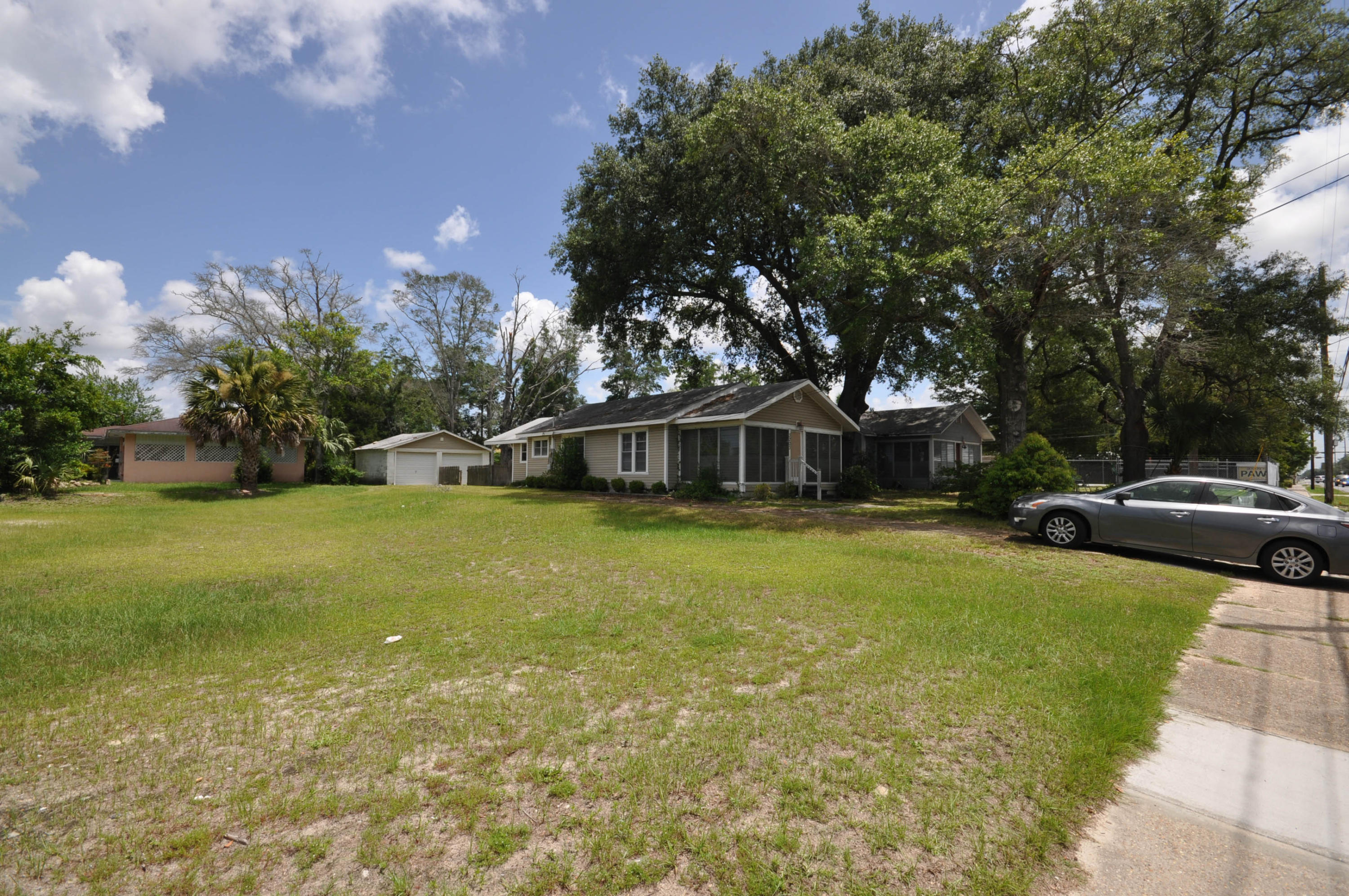 Owner financing available with 20% down!!!! This Old Florida style cottage features 3 bedrooms with one full bathroom. With a detached 2-car garage/storage building and fenced backyard, this would be the perfect first home for a new couple. Would make for a great fixer-upper and is on a very decently sized lot. Walking distance to Burger King, Dollar General, Springfield Plaza and Springfield Gardens Walking Park. For more information please contact us today!