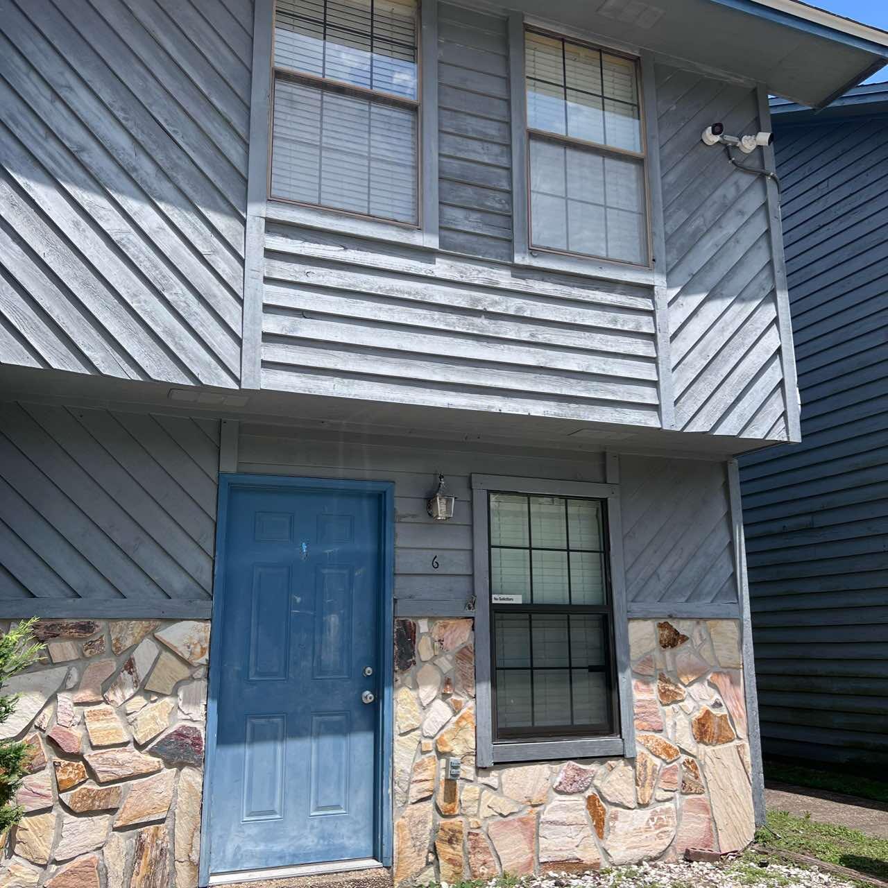 2-bedroom, 1.5-bath townhome-style unit offering a functional layout and comfortable living space. Residents enjoy access to a community pool.