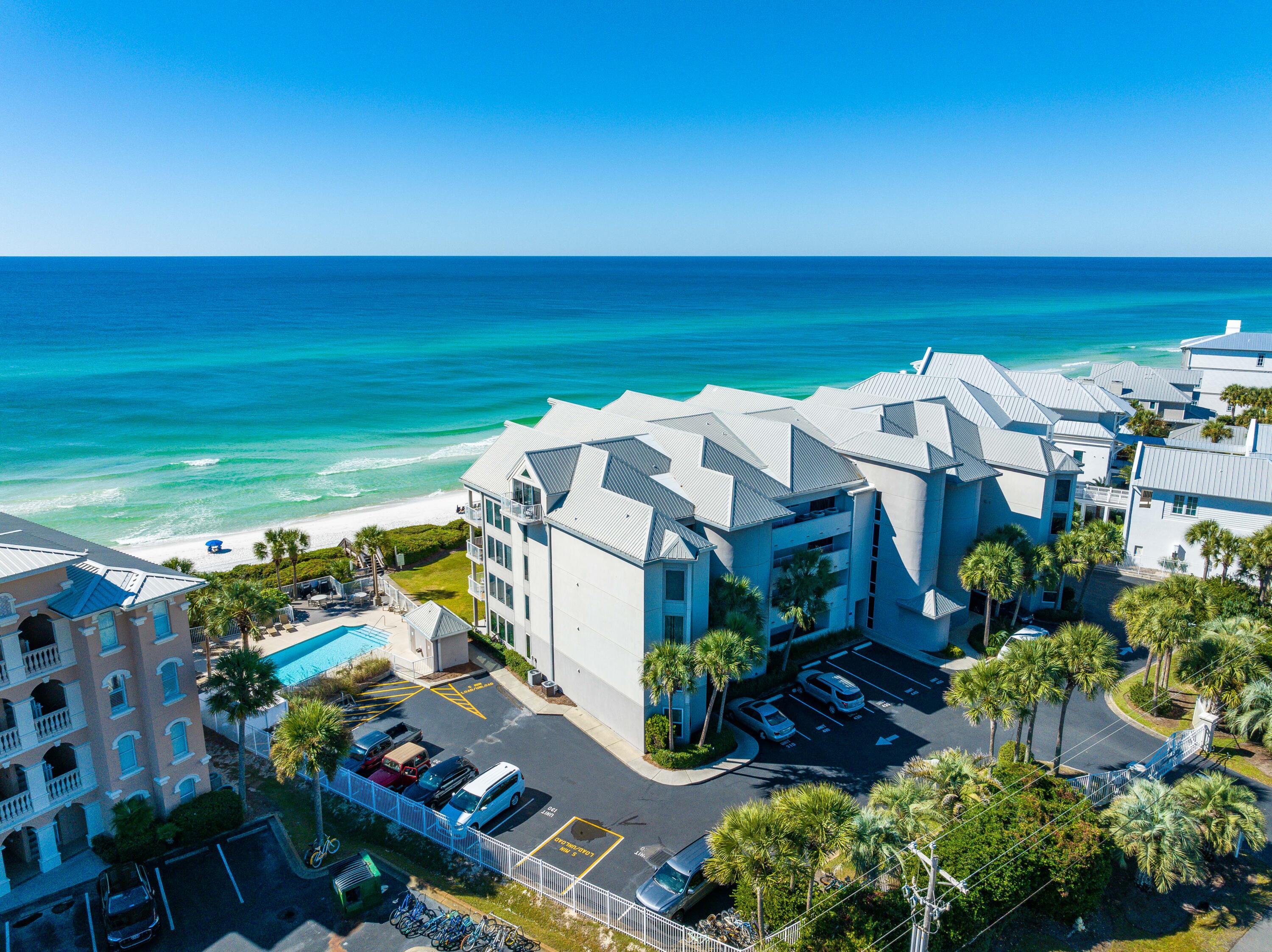 Price just reduced for quick sale! Come and see this spectacular unit that boasts rental projections of over $120k. Whether for personal use or rental purposes, Tranquility on the Beach, Unit 230 is the perfect place to call your own on 30A. Situated right on the beach, this unit offers breathtaking views of the emerald waters and white sandy beaches from the master bedroom, kitchen, and living room. With three bedrooms and three bathrooms, it is an ideal primary, second, or investment home. The kitchen is spacious and well-equipped with stainless steel appliances, ample storage, and white countertops. The dining and living areas are open-plan, perfect for entertaining. Enjoy the outdoors with a large patio overlooking the Gulf. This luxury gated condominium complex boasts only 20  residences and comes with a range of amenities such as owners' storage, a heated gulf-side pool, and lush tropical landscaping surrounding the property. Don't miss out on this opportunity!