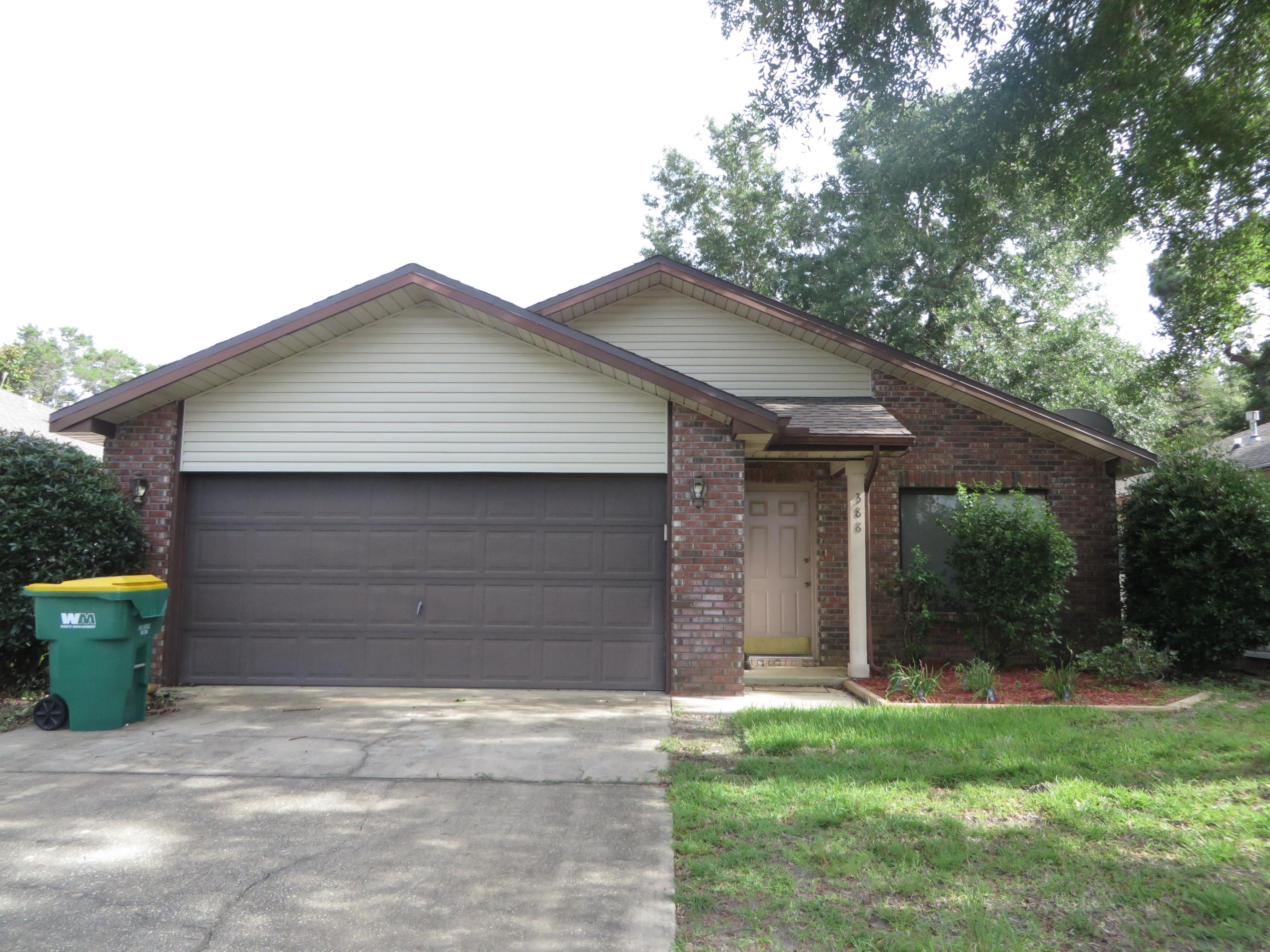 This two bedroom ,two bath,two car garage,Barton built home is located close to schools, Eglin AFB and Hospital. Walking distance to Northwest Florida State College. Vaulted ceilings in great room, with new laminate wood floors. large eat-in kitchen opens to back patio. Low maintenance brick and vinyl exterior. Fenced backyard with sprinklers for all the landscaping. Great neighborhood with sidewalks, streetlights and underground utilities. No smokers.