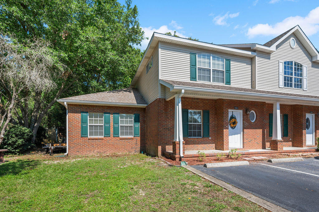 Where can you find so much sq.ft for this price?  Nestled in the serene and sought-after community of Grand Oak Place, this beautifully maintained end unit townhome is ready to welcome its new owners. With only nine townhomes in the neighborhood and anchored by a majestic Old Oak tree, the setting exudes a warm, inviting sense of community and privacy. Recent updates include a brand-new roof 2025, HVAC system (2022), Refrigerator 2026, and new granite countertops, newer microwave, newer, newer garbage disposal, ensuring comfort and peace of mind for years to come. Step inside to a bright, open-concept floor plan that effortlessly connects the living room, dining area, and kitchen—perfect for entertaining or everyday living. The first-floor master suite offers a peaceful retreat with an abundance of natural light, a spacious walk-in closet, and a relaxing ambiance to end your day