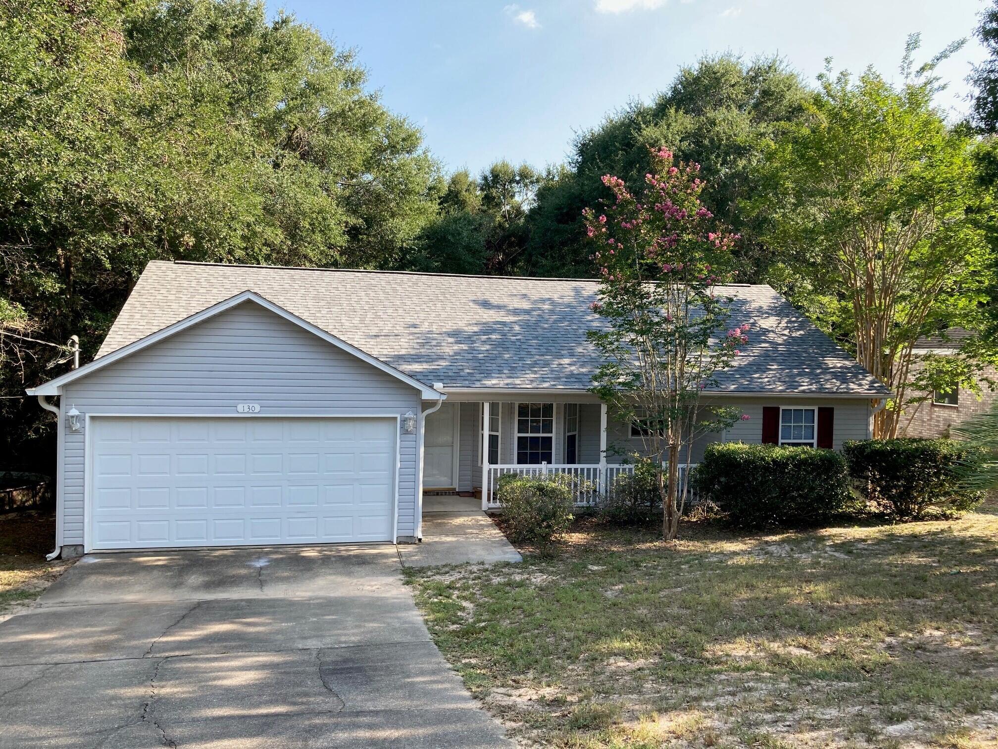 Very nice 3bed/2bath split design with a large covered deck off the sliding glass door. Gorgeous kitchen with granite countertops and bar. Master bedroom with large walk-in closet and bathroom. Large fenced in backyard. Stainless steel appliances including newer dishwasher.  AC was replaced 2 years ago.  Brand new flooring throughout living room and brand new tile in bathrooms and utility room. Large, nice front porch and 2 car garage.  Come see this rental today!